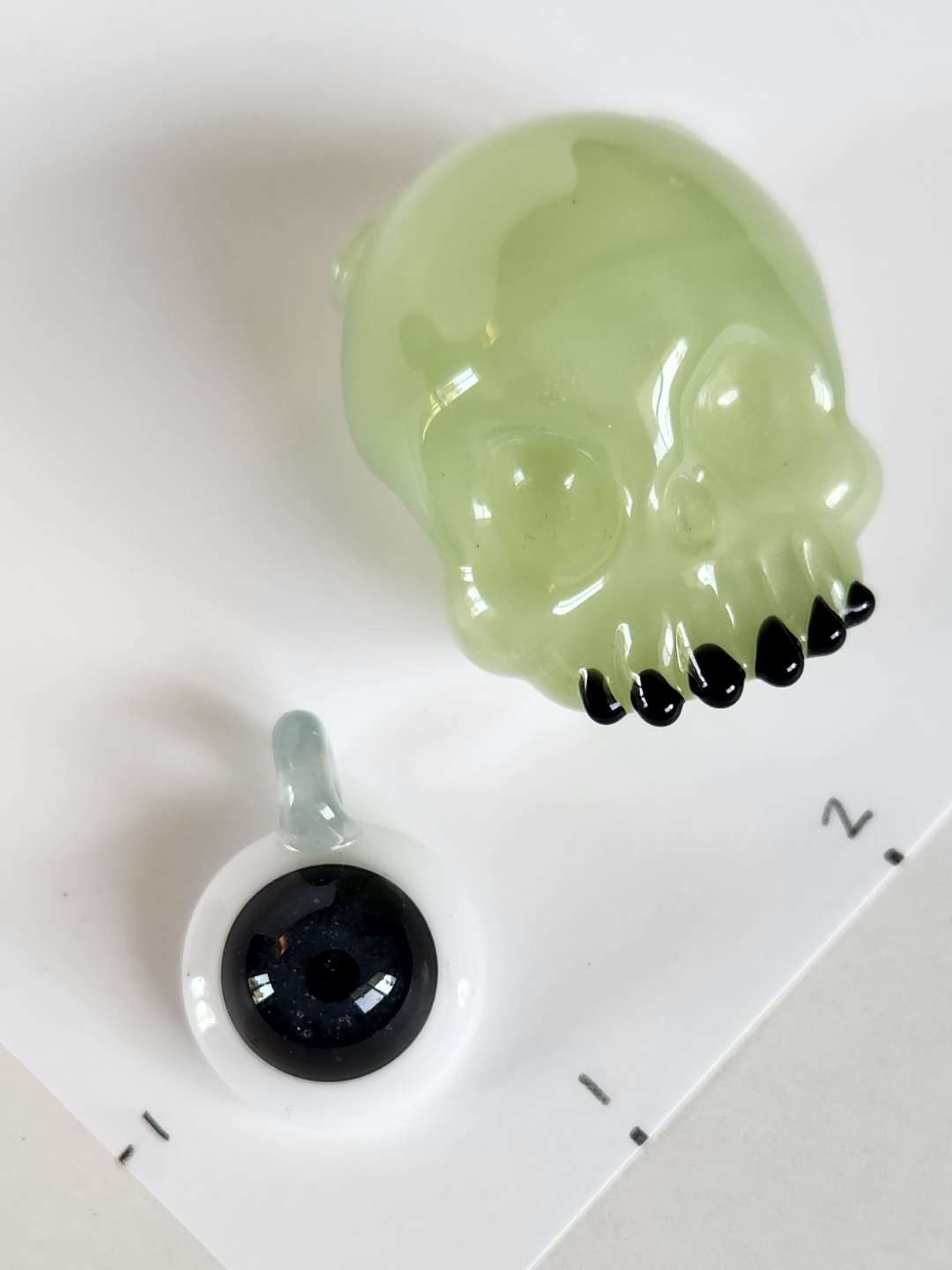 Preview pic of Drewbie Glass - CFL Skull Pendant