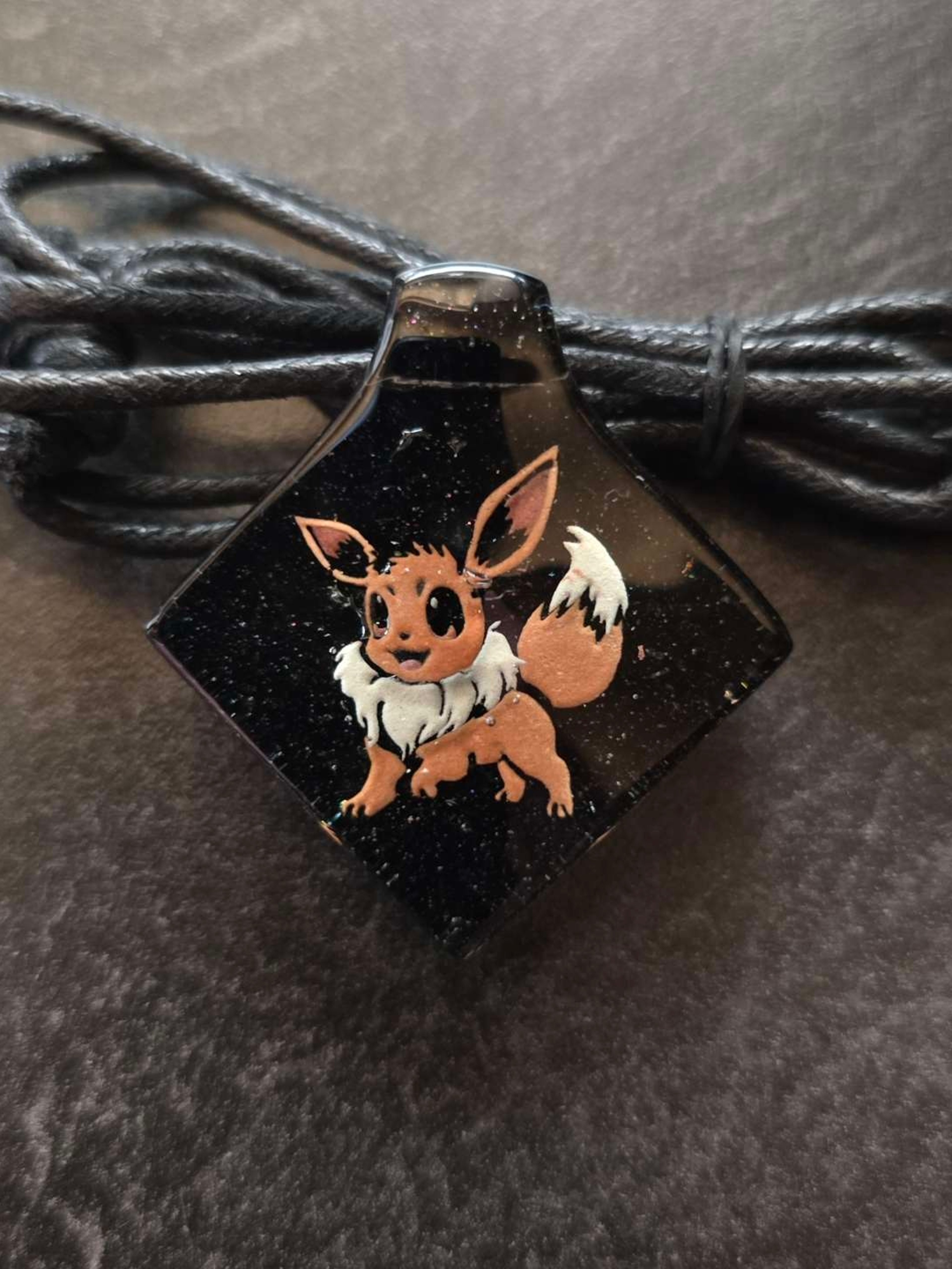 Preview pic of Eevee Pokemon Layered Glow UV Pendant