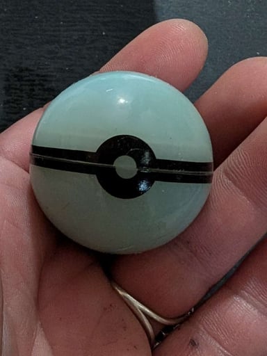 Preview pic of Glow in the dark Pokemon Ball Container