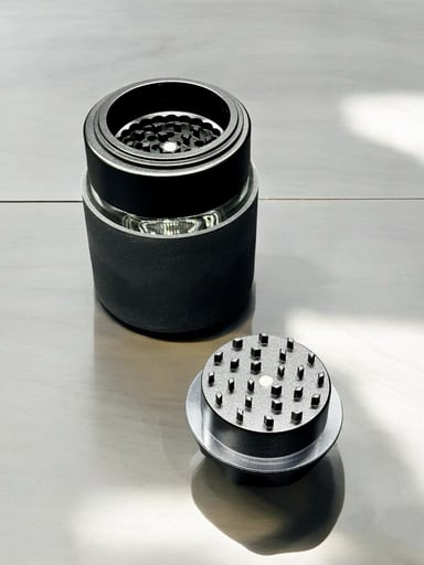Preview pic of 2-in-1 Black Glass Jar with Built-In Grinder – 4” Tall, 2.7” Wide with Silicone Grip