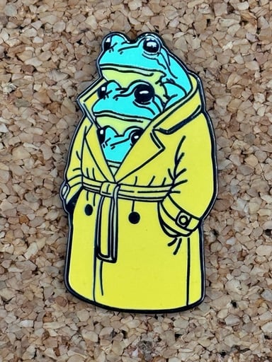 Preview pic of Trench coat frogs pin