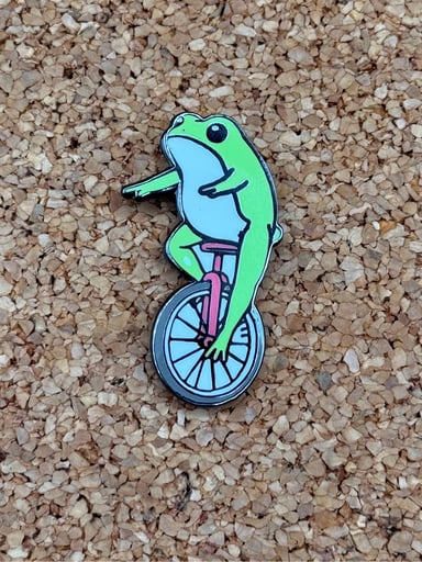 Preview pic of Unicycle frog pin