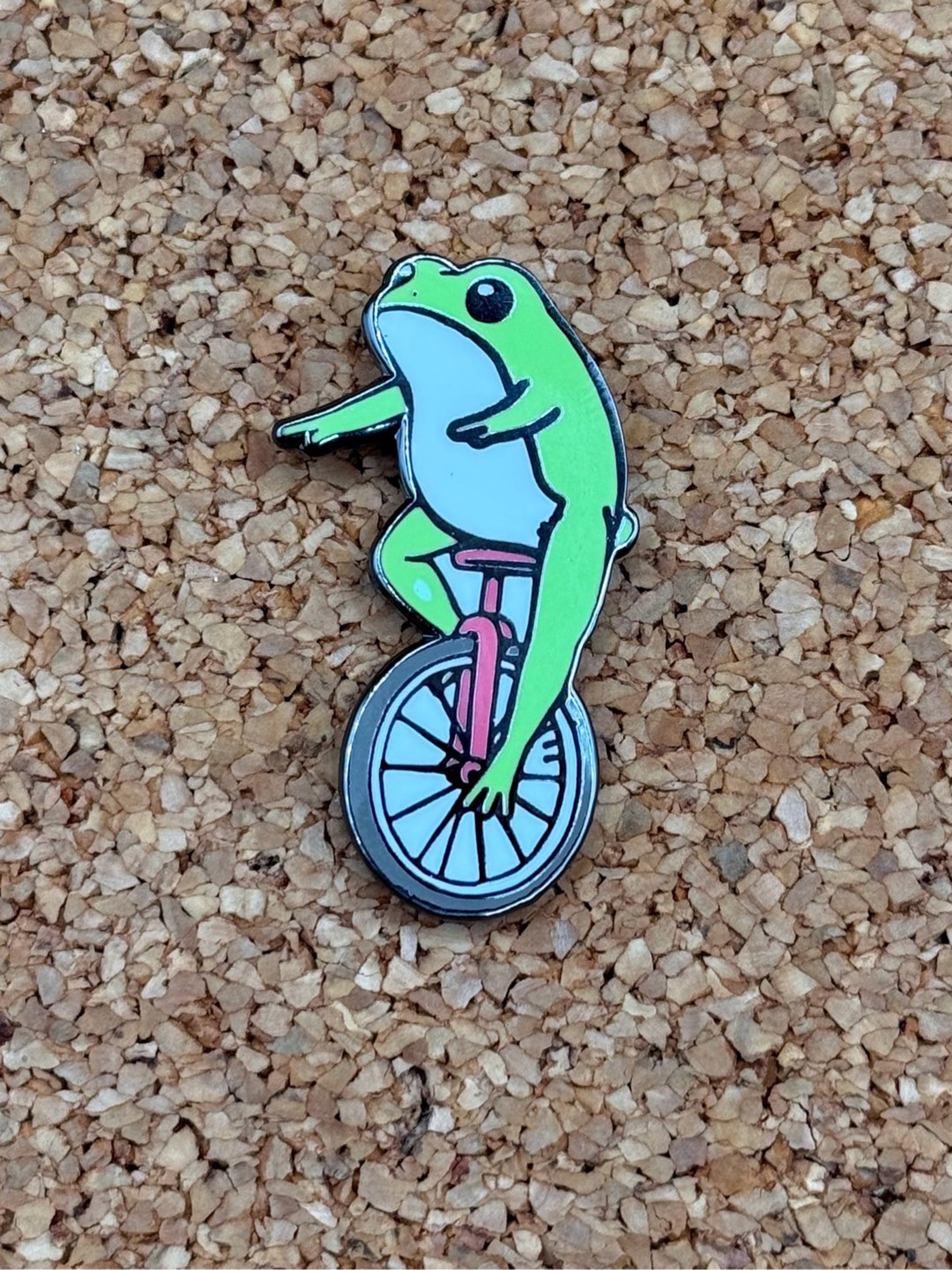 Preview pic of Unicycle frog pin