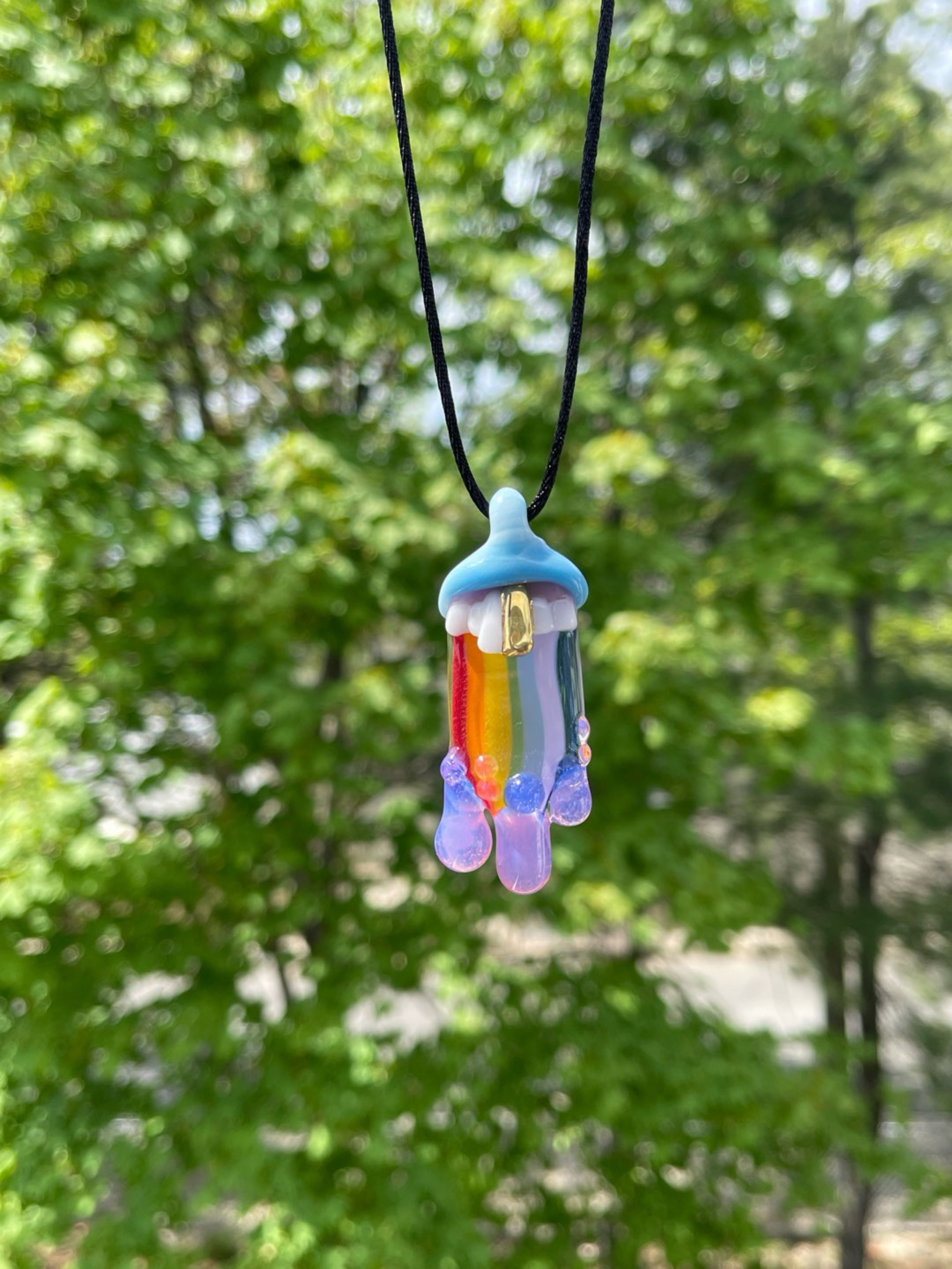 Preview pic of Purple Drippy Pendant w/ Gold Tooth