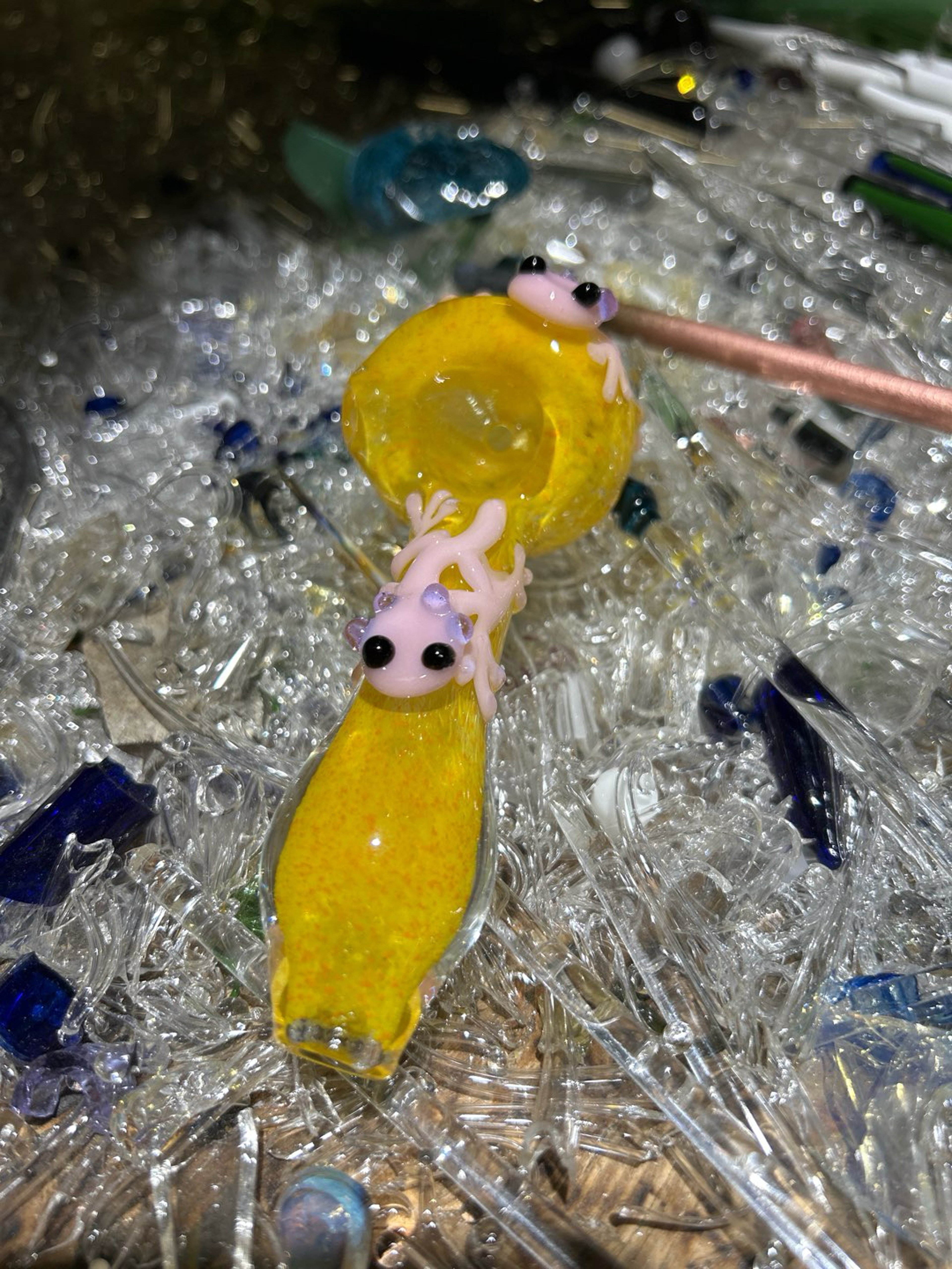 Preview pic of Pink axolotl on yellow spoon
