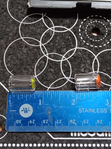 Preview pic of 2 pack of 12 mm clear with color 4 hole joint tips