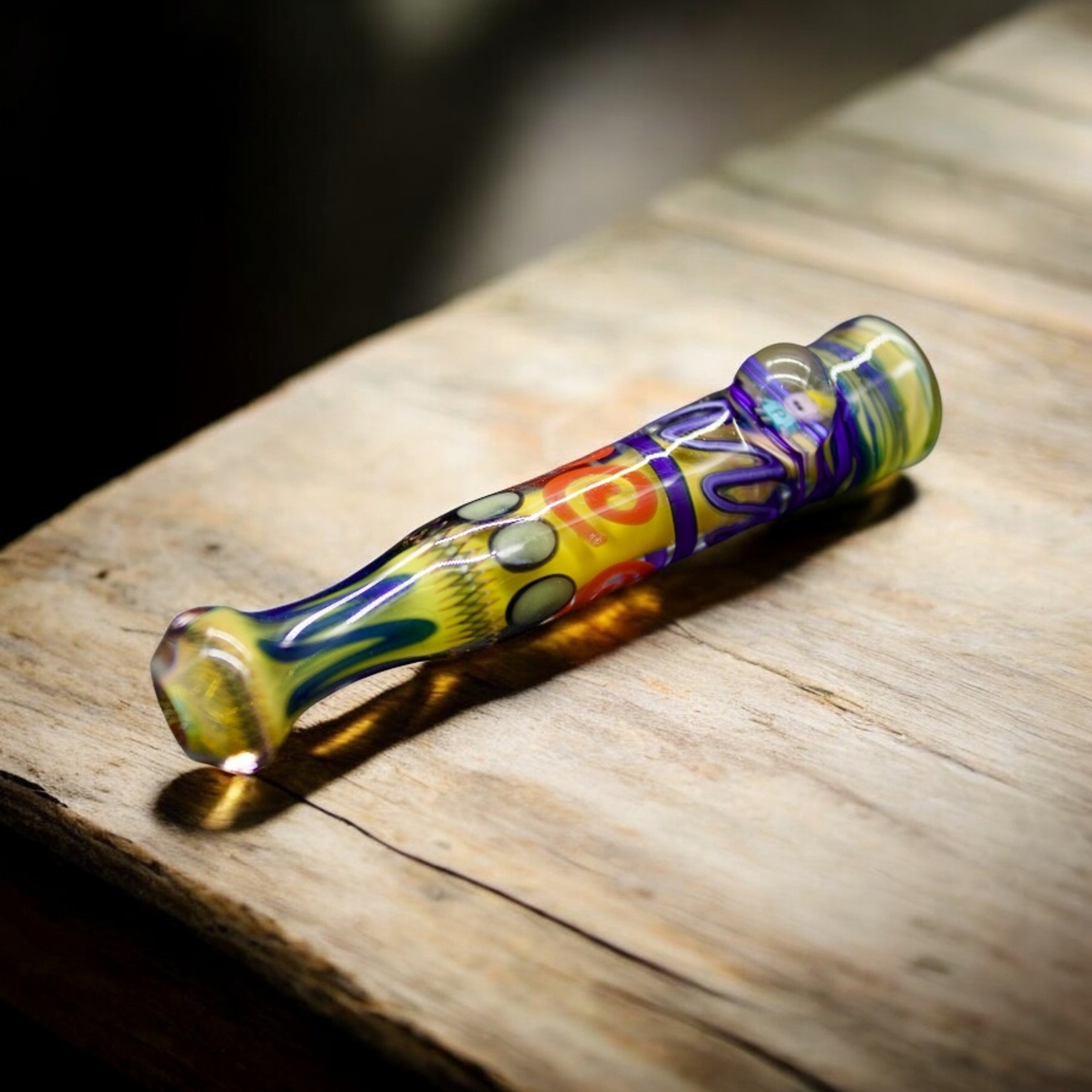 Preview pic of Hand Blown Chillum Glass Pipe 3.5” Vibrant Color with Anti-Roll Dot & Cartoon Figure