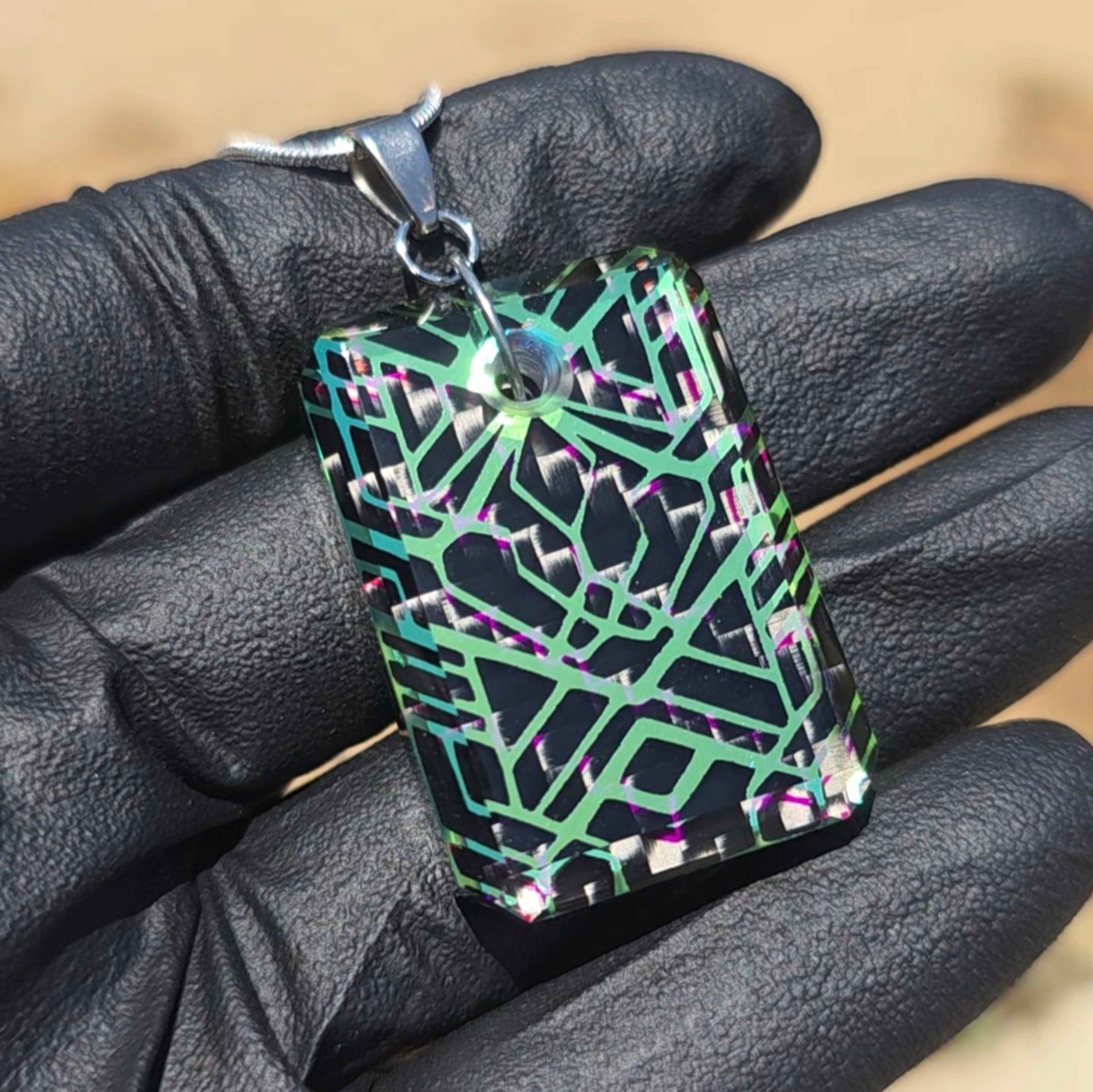 Preview pic of Carbon Fiber & Geometric Etched Dichro Faceted Pendant