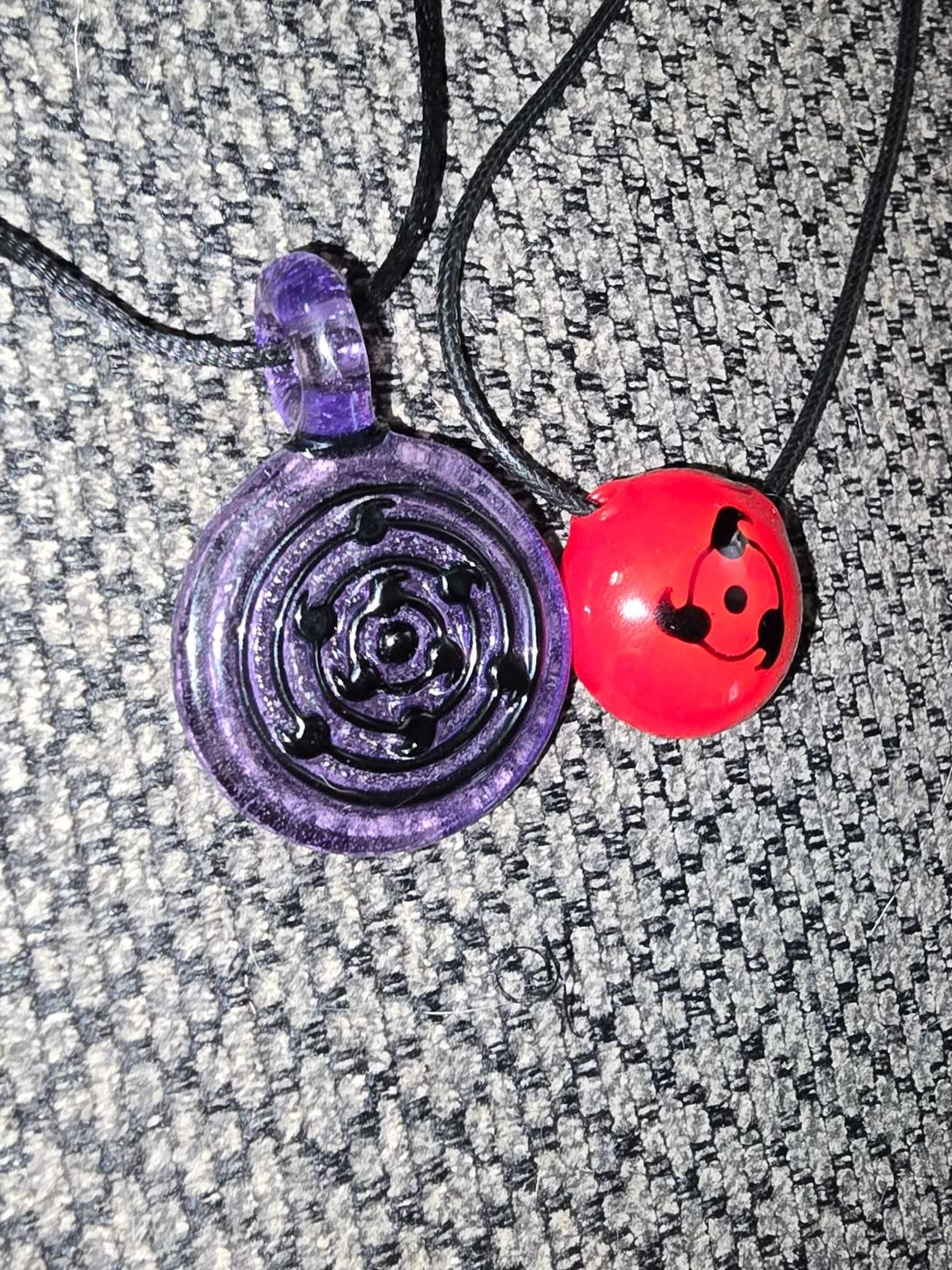 Preview pic of Naruto Pendants - Rinnegan and Sharingan