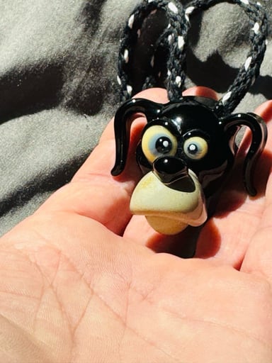 Preview pic of Cal Smith sculpted dog head pendant with hemp chain🔥