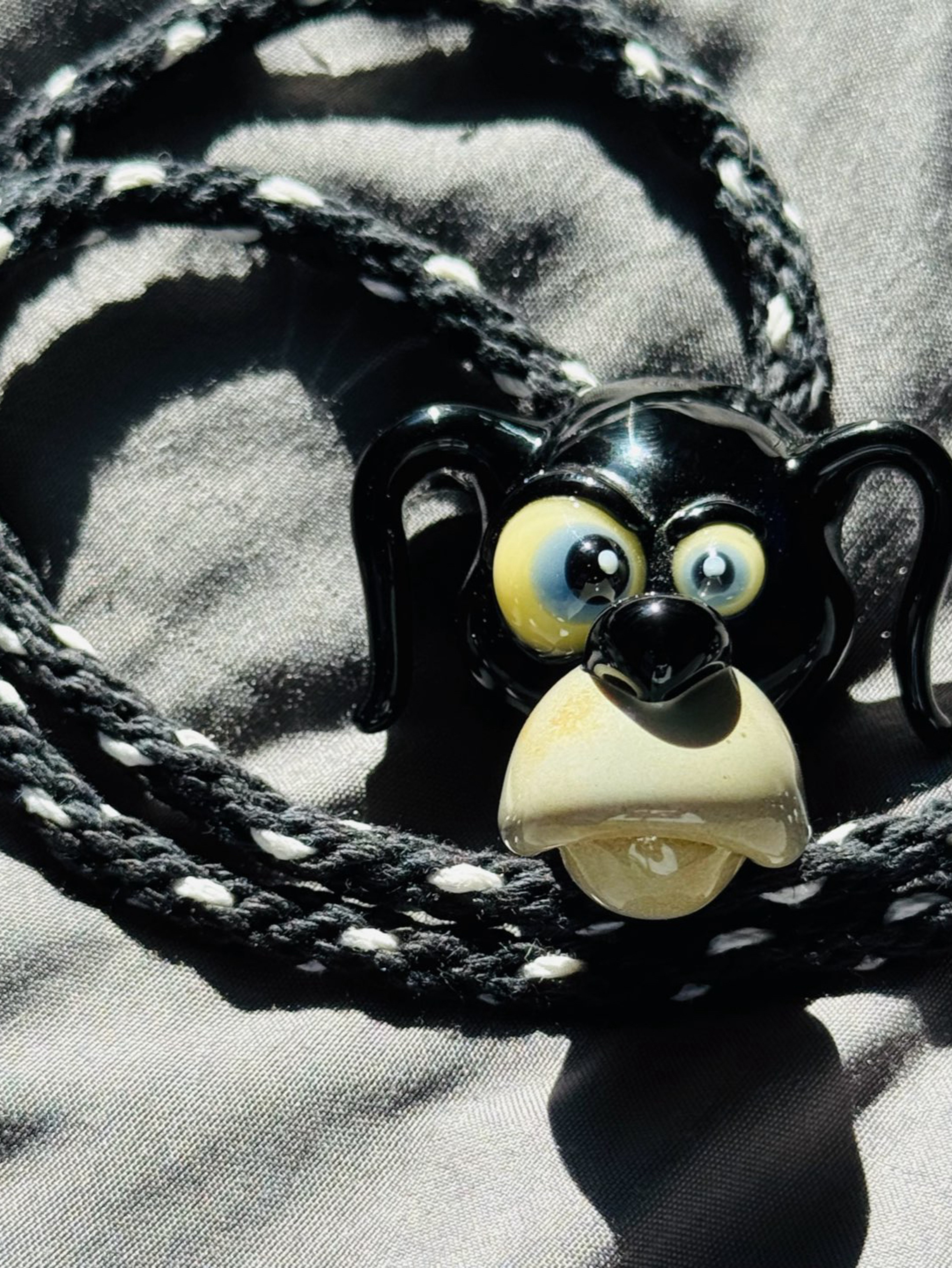 Preview pic of Cal Smith sculpted dog head pendant with hemp chain🔥