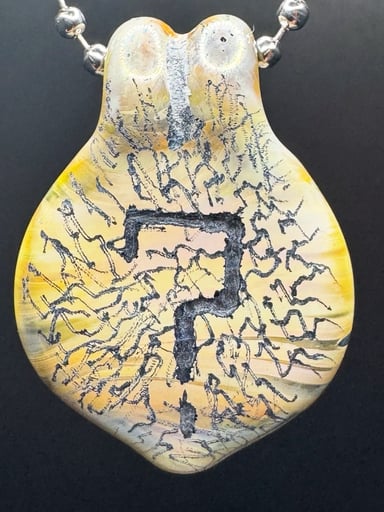 Preview pic of Tipper carved pendant