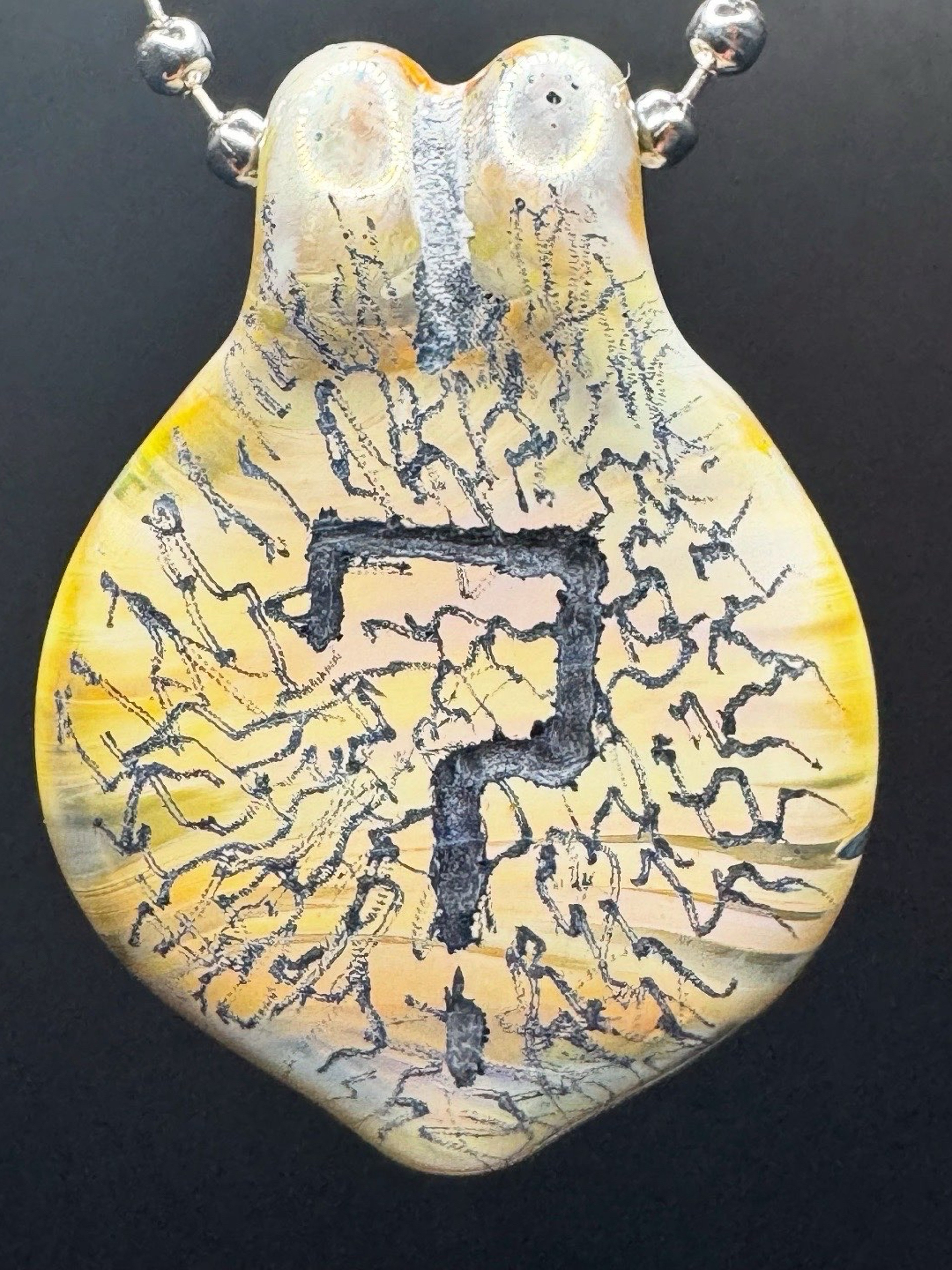 Preview pic of Tipper carved pendant