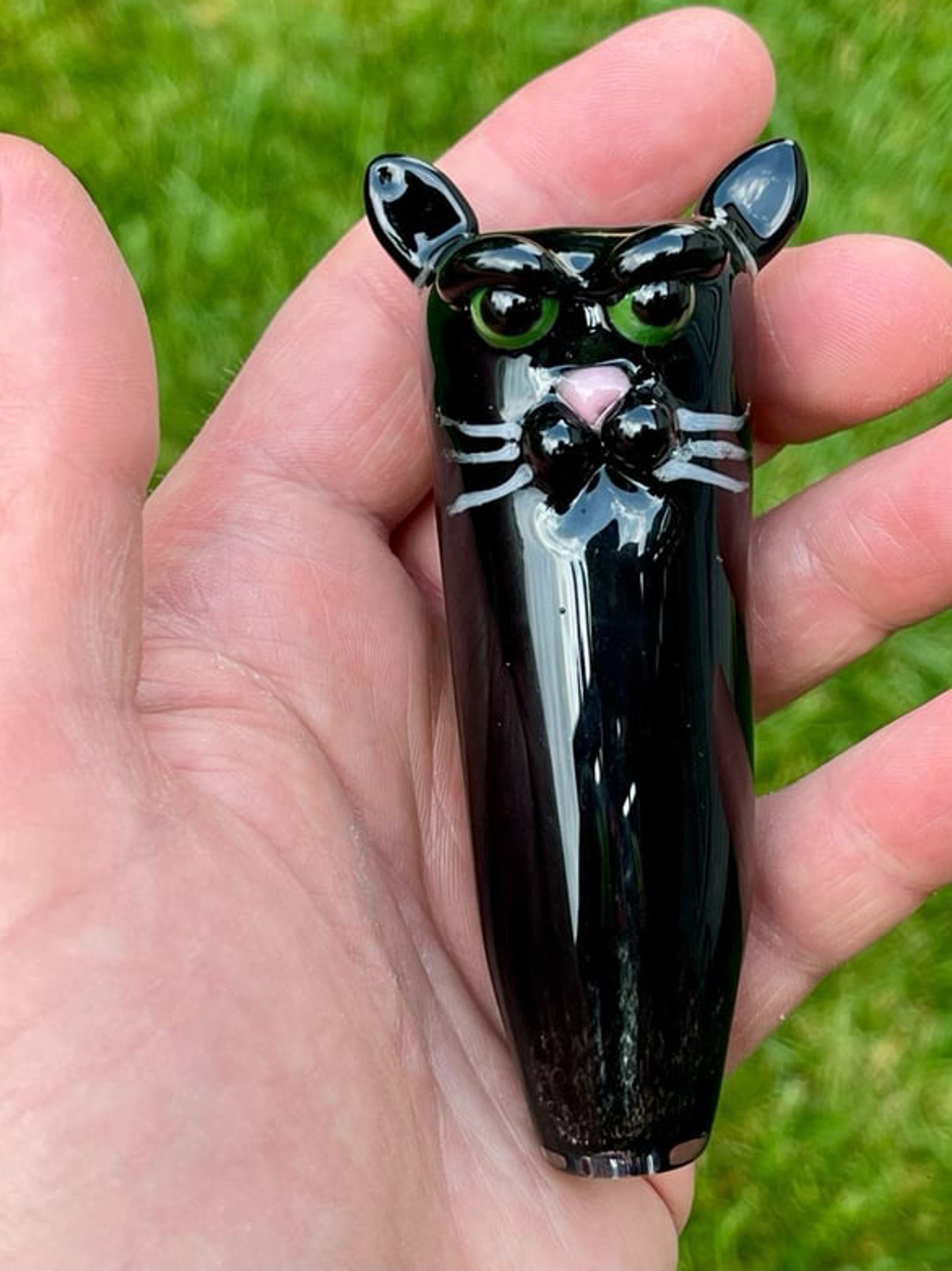 Preview pic of Black glass cat with green eyes chillum.