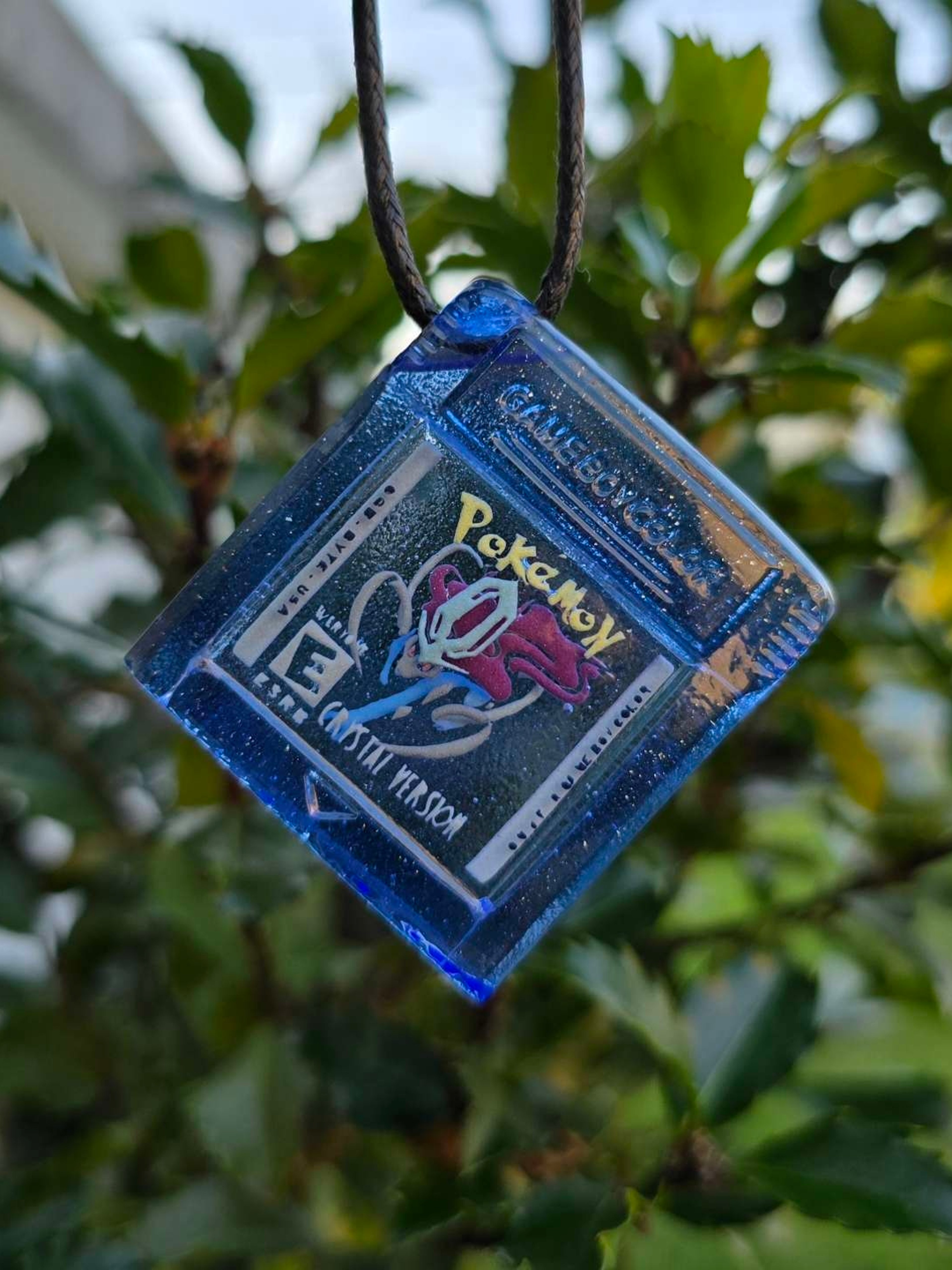Preview pic of Pokemon Crystal Game Cartridge Layered Glow UV Pendant