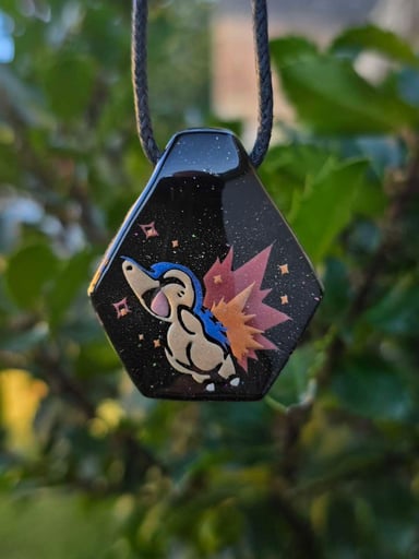 Preview pic of Cyndaquil Layered Glow UV Pendant