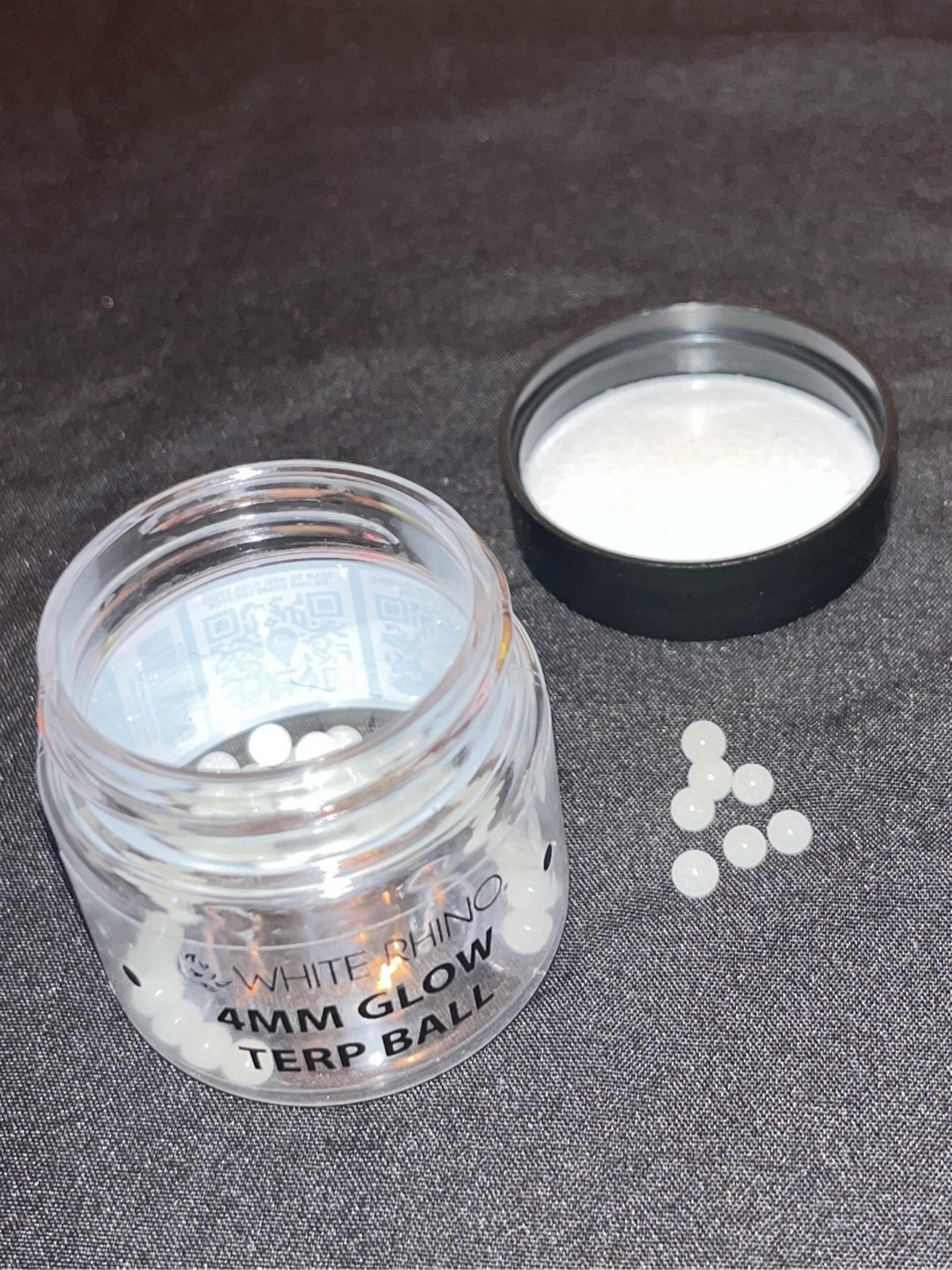 Preview pic of 4mm White Rhino Glow-in-the-Dark Terp Pearls – Smooth, Even Dabs Every Time!