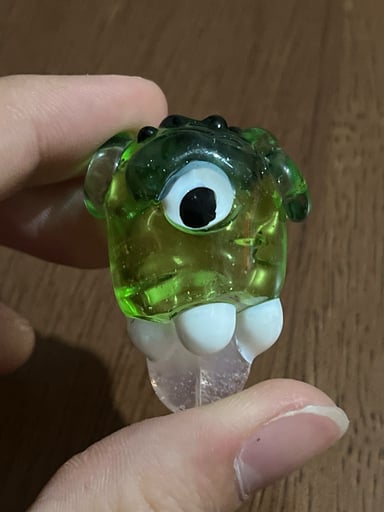 Preview pic of Tattoo face creature pendy