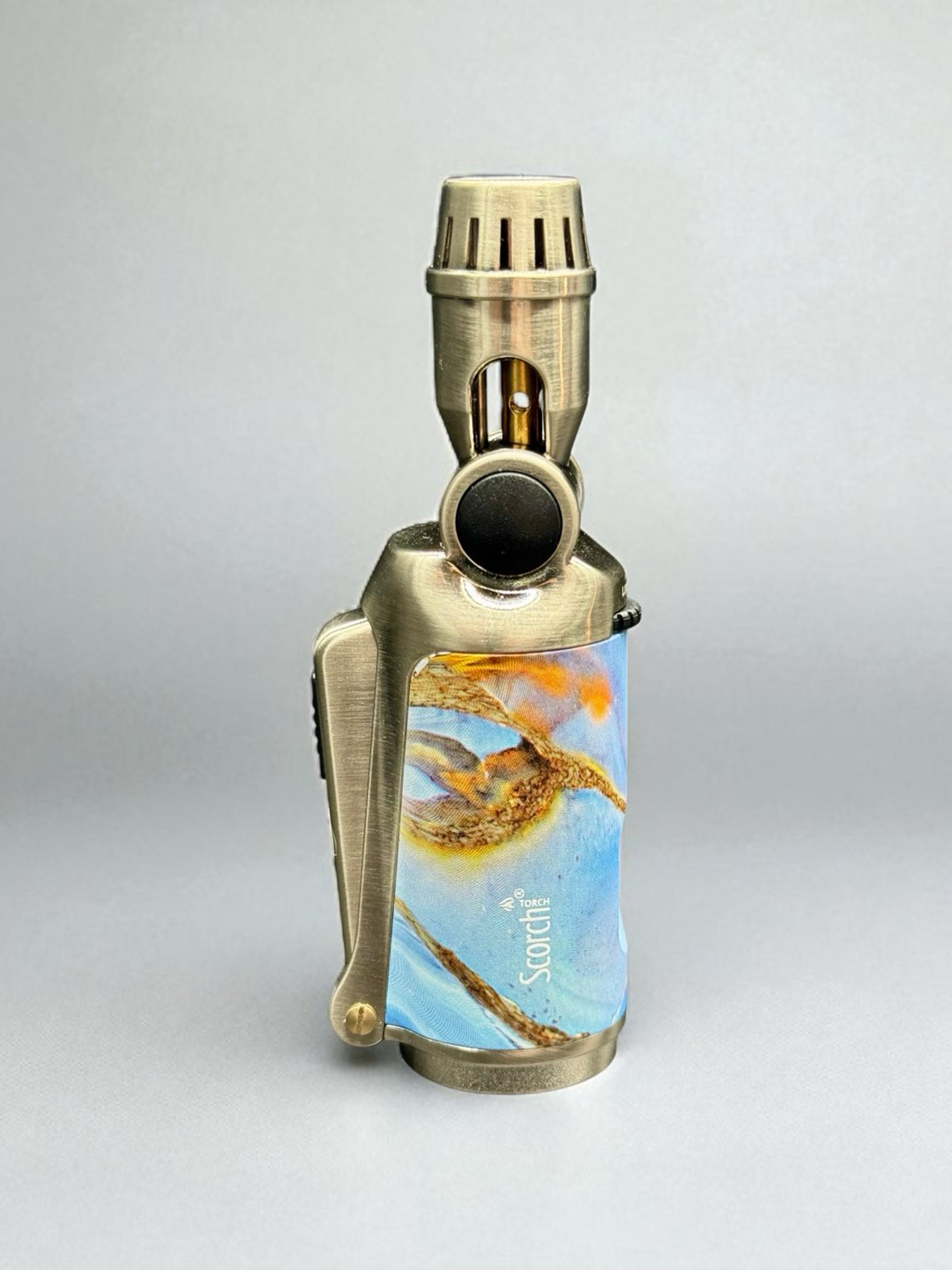 Preview pic of Scorch Torch 61829 Refillable Butane Torch Lighter – Single Flame Adjustable Angle – 4.5” Silver with Blue/Orange Design