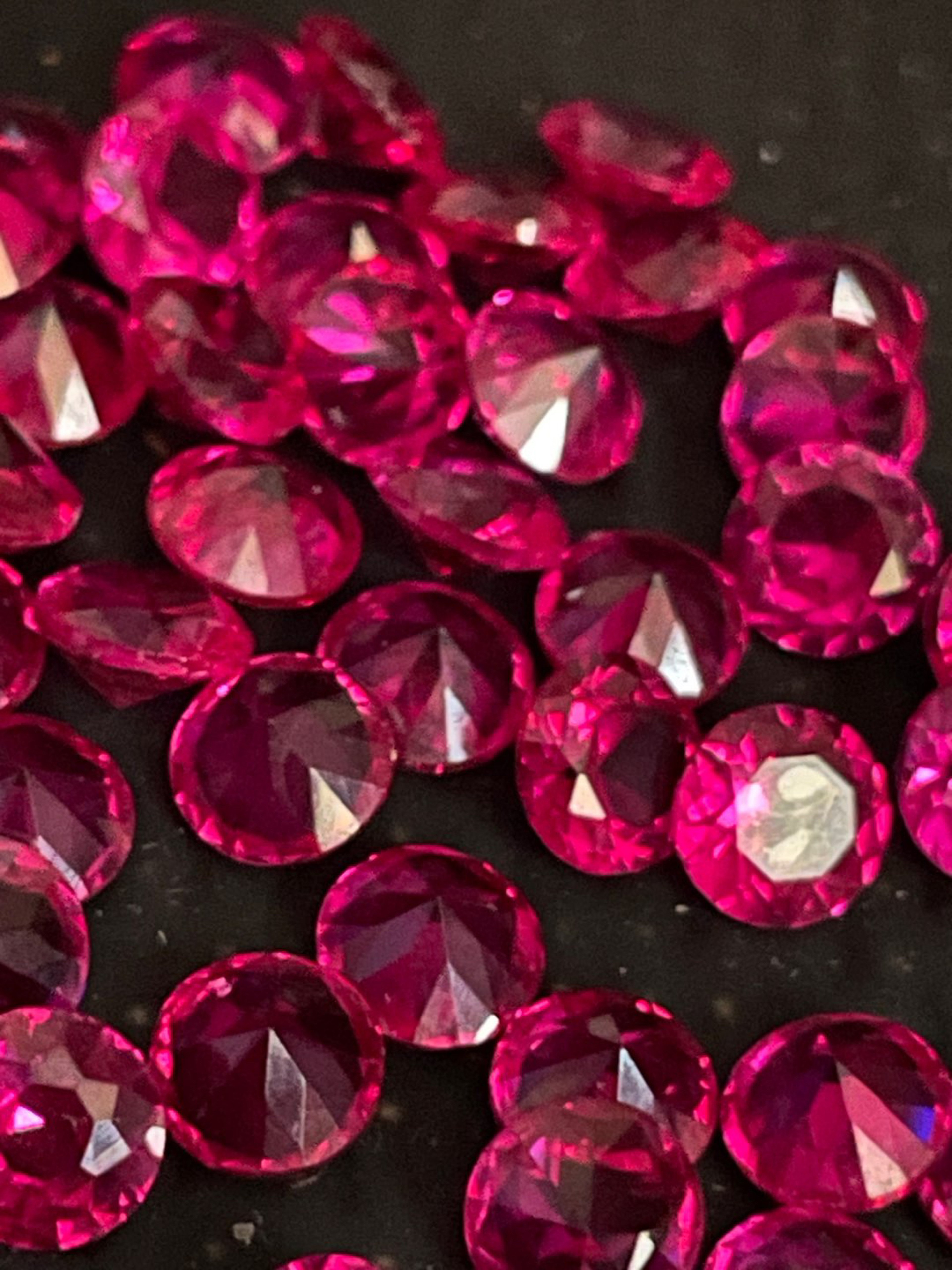 Preview pic of 5mm Diamond facted ruby pearls.