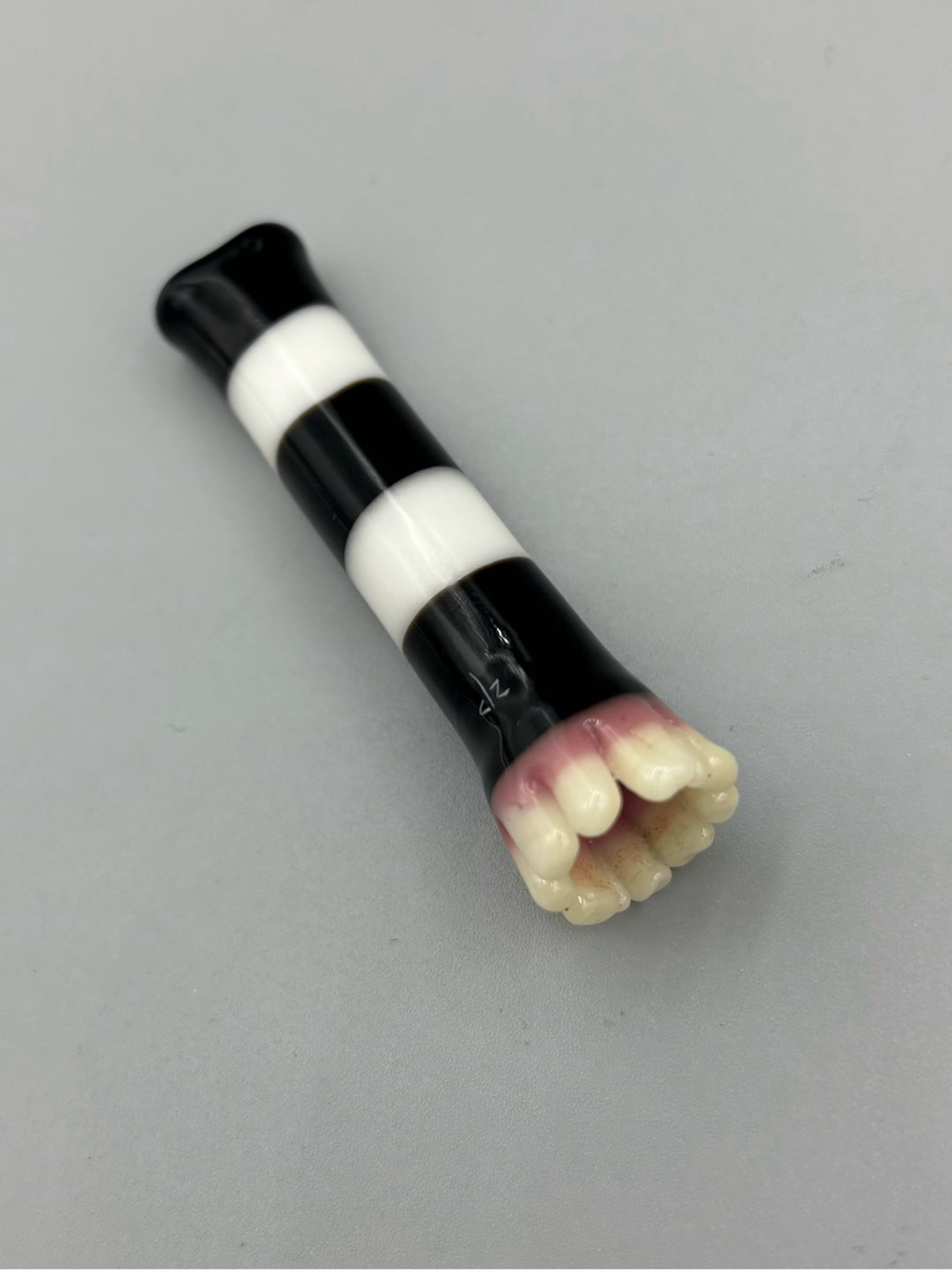 Preview pic of Ouchkick Toothy Tip | Signed