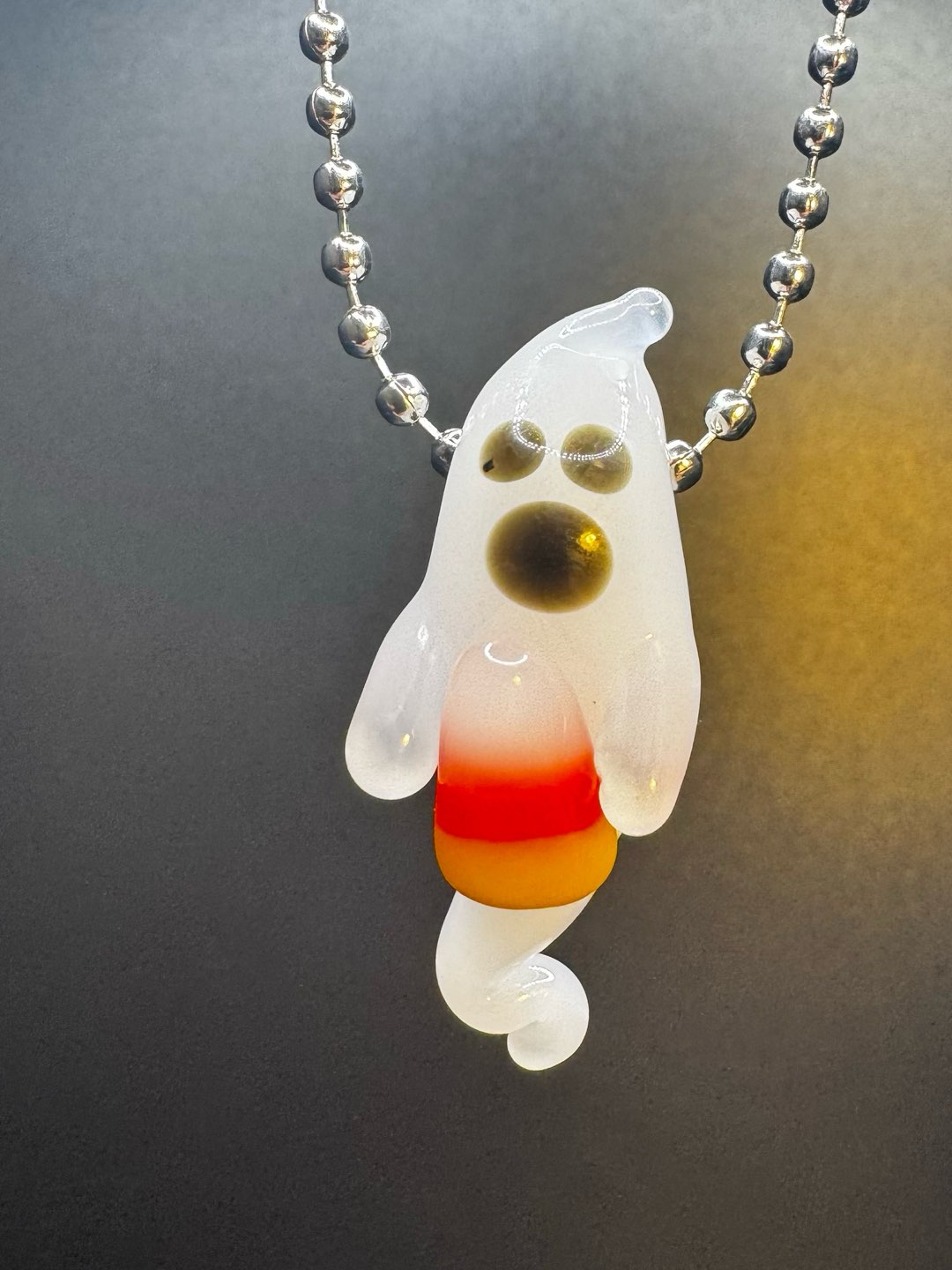 Ghost holding candy corn pendant image 0