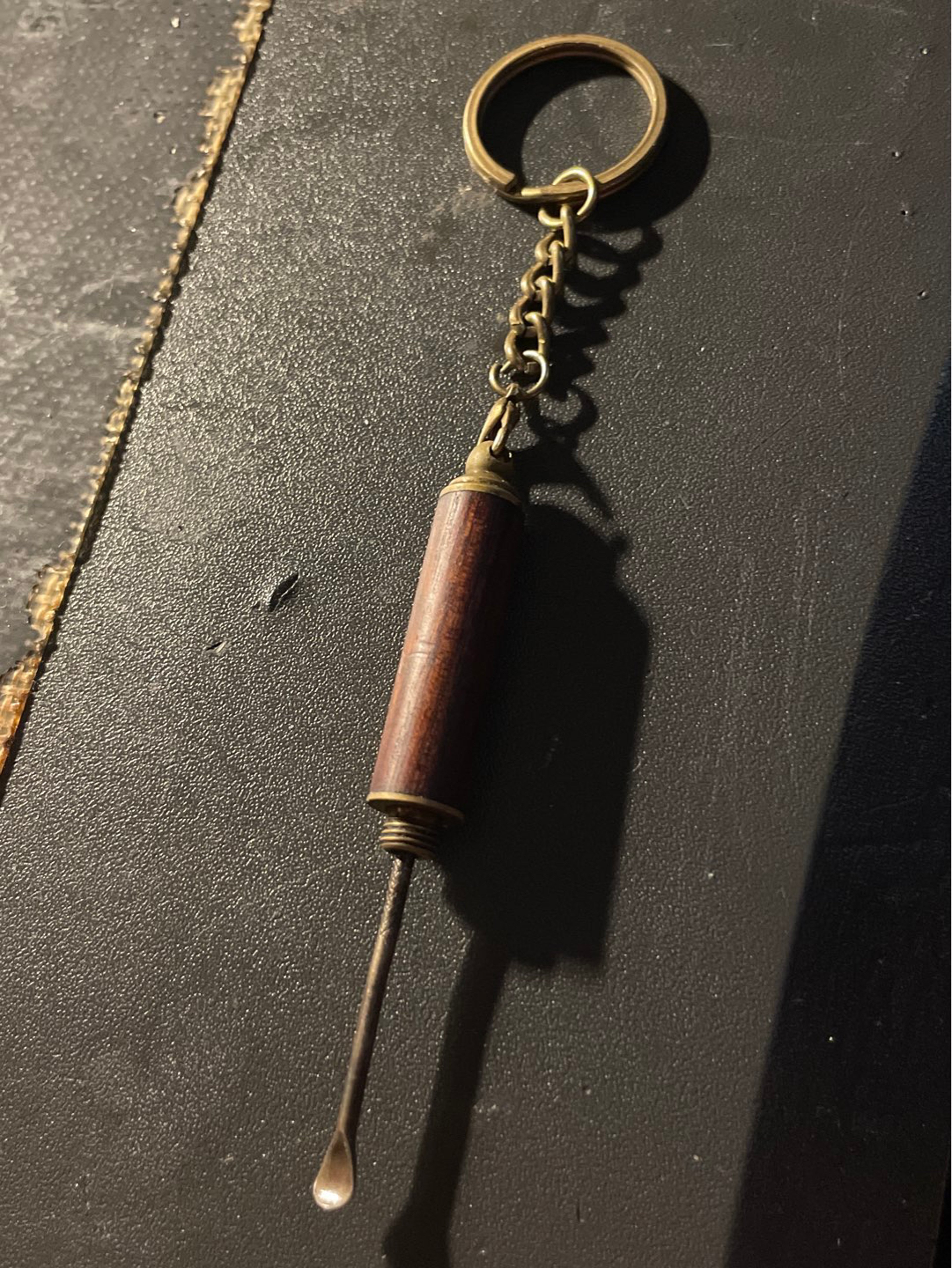 Preview pic of Travel sized dab tool w/ brass accents and chain.
