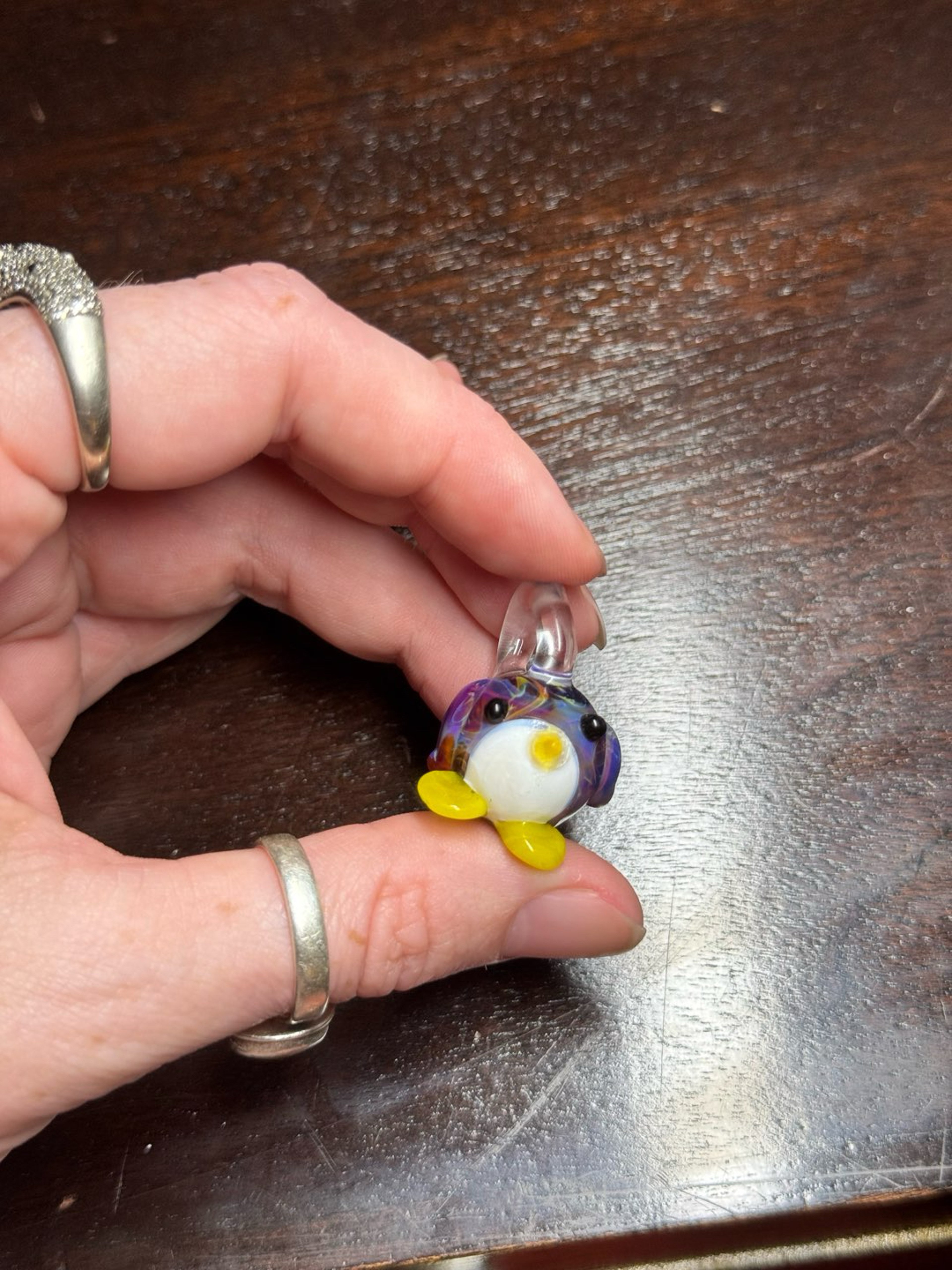 Penguin pendant (amber purple) image 0