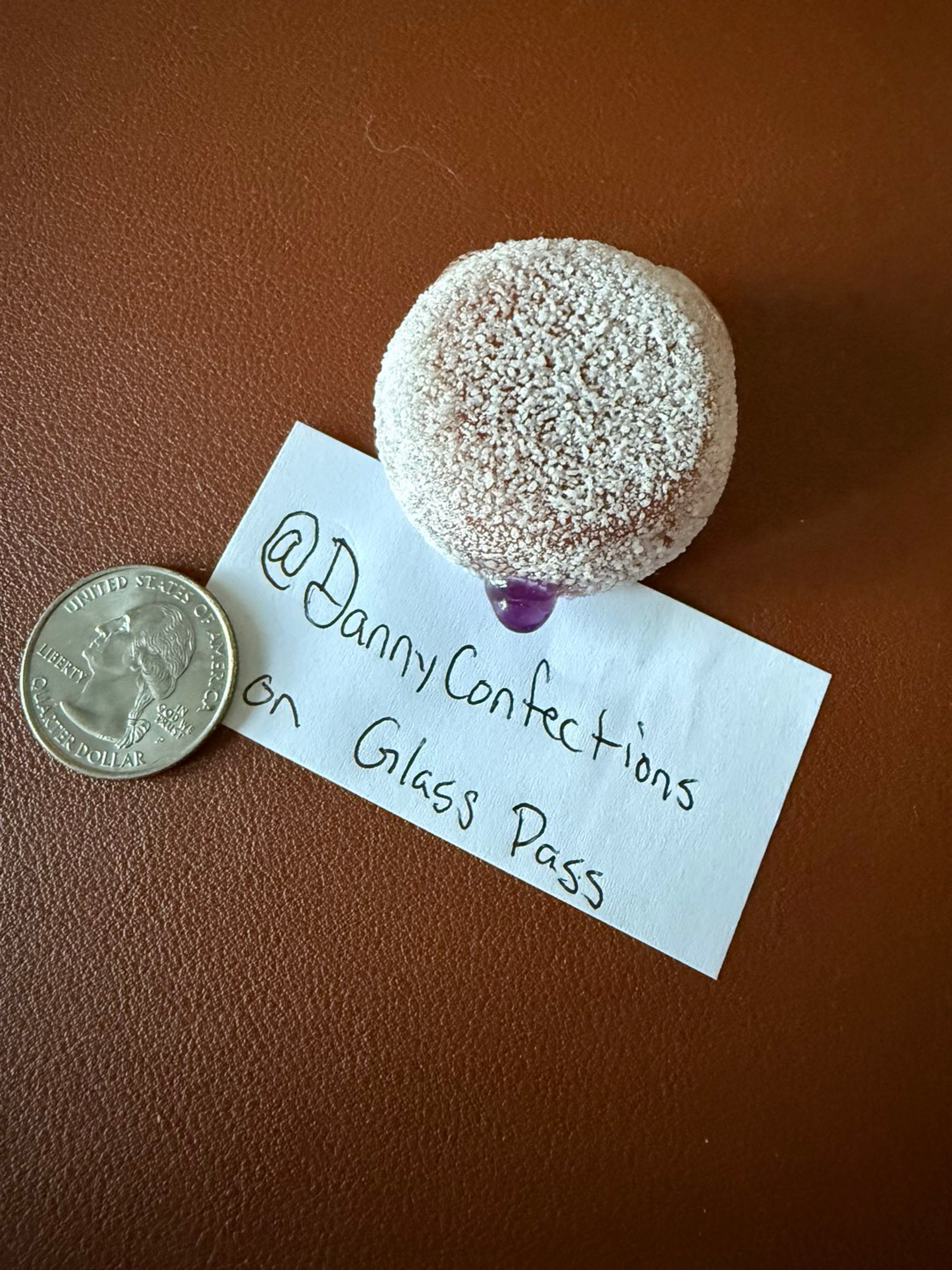 Preview pic of KGB Jelly Donut - Powdered & Grape filled