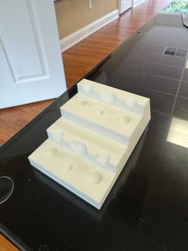 Preview pic of 3d printed cap stand(powerpat logo on back