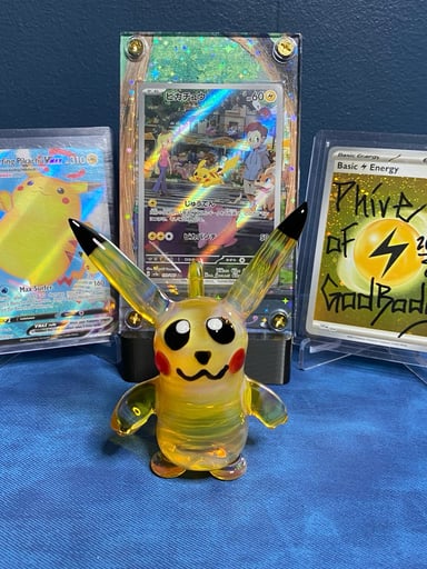 Preview pic of Pikachu Glass Desk Piece w/ JPN 151 Pikachu AR in Extended Art Case, Surfing Pikachu VMax & Energy!