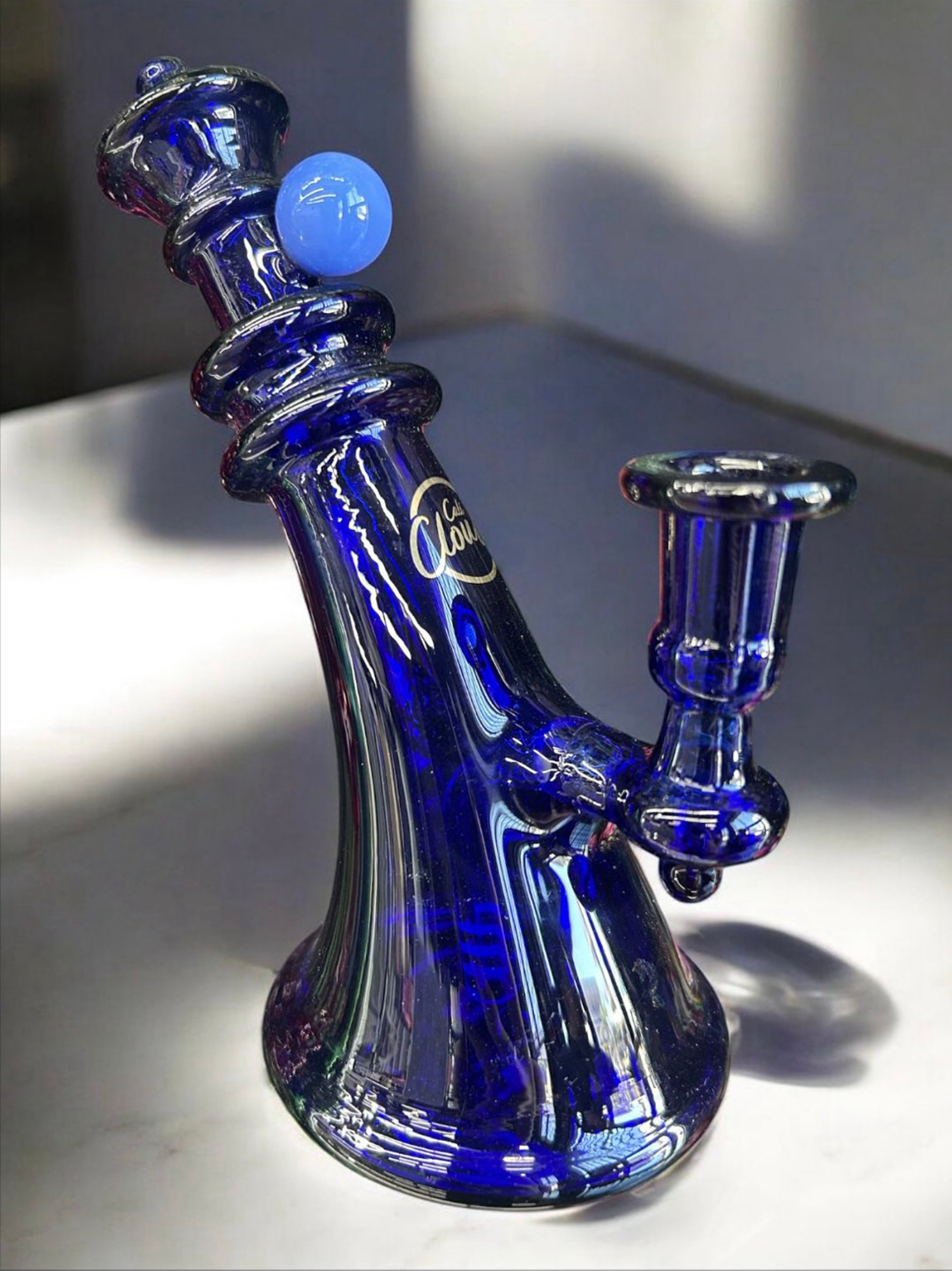 Preview pic of Cali Cloud Royal Blue 💙 Sloped 7" Art Deco Bong 14mm Joint w 6 Slit Perc