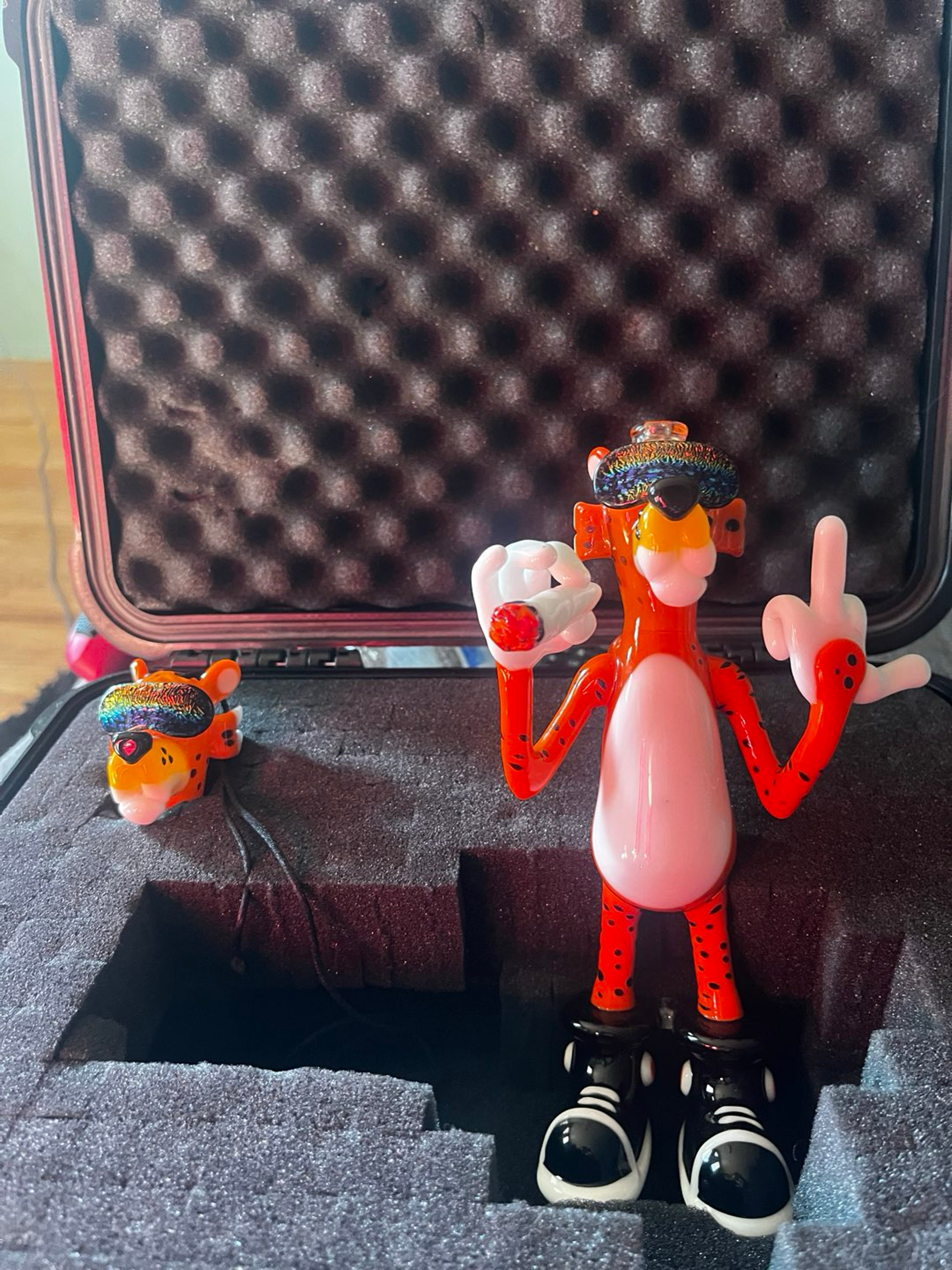 Preview pic of Rude Boy Chester Cheetah smoking a blunt
