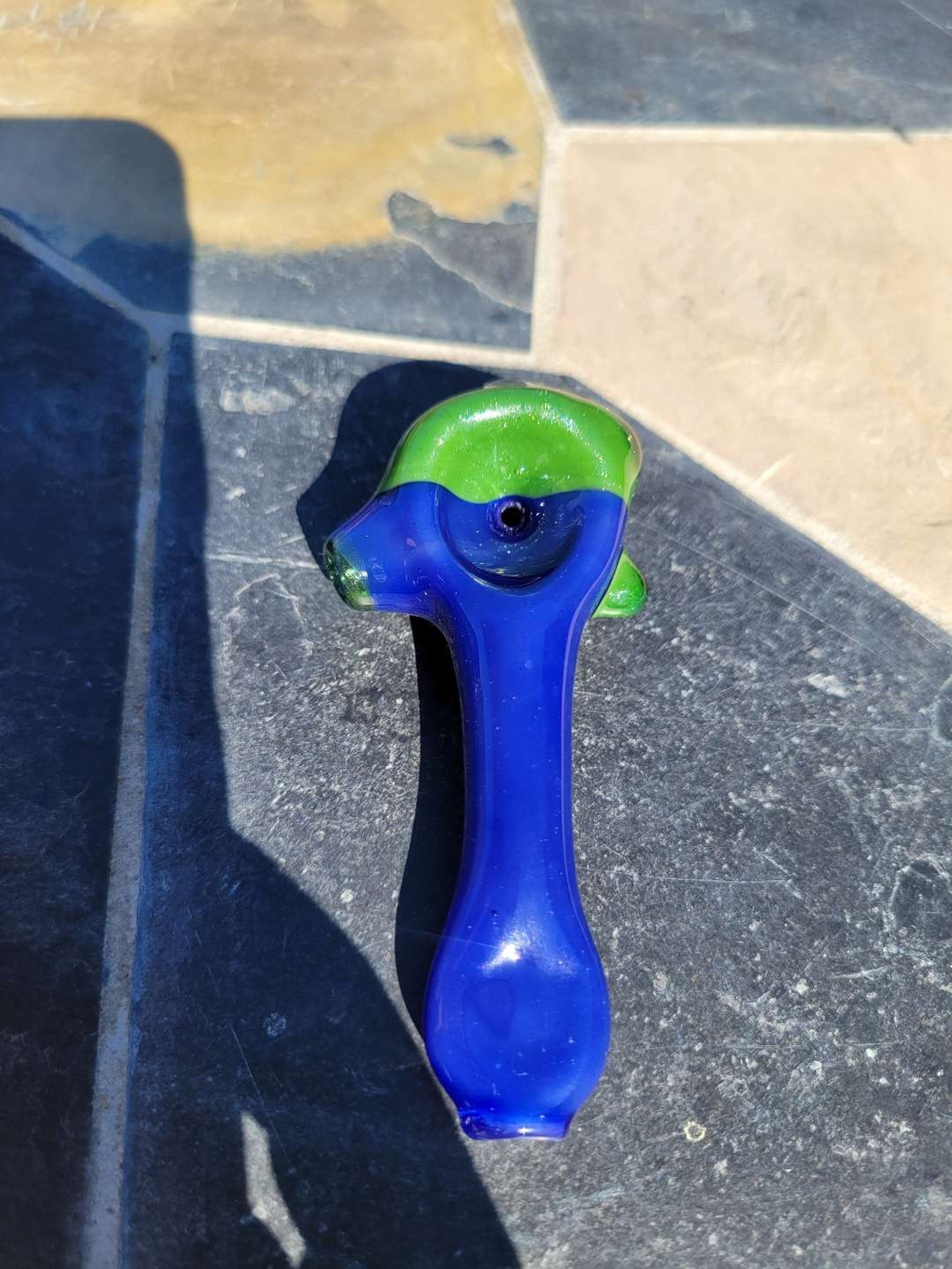 Purple urple spoon with sparkly green cap image 0