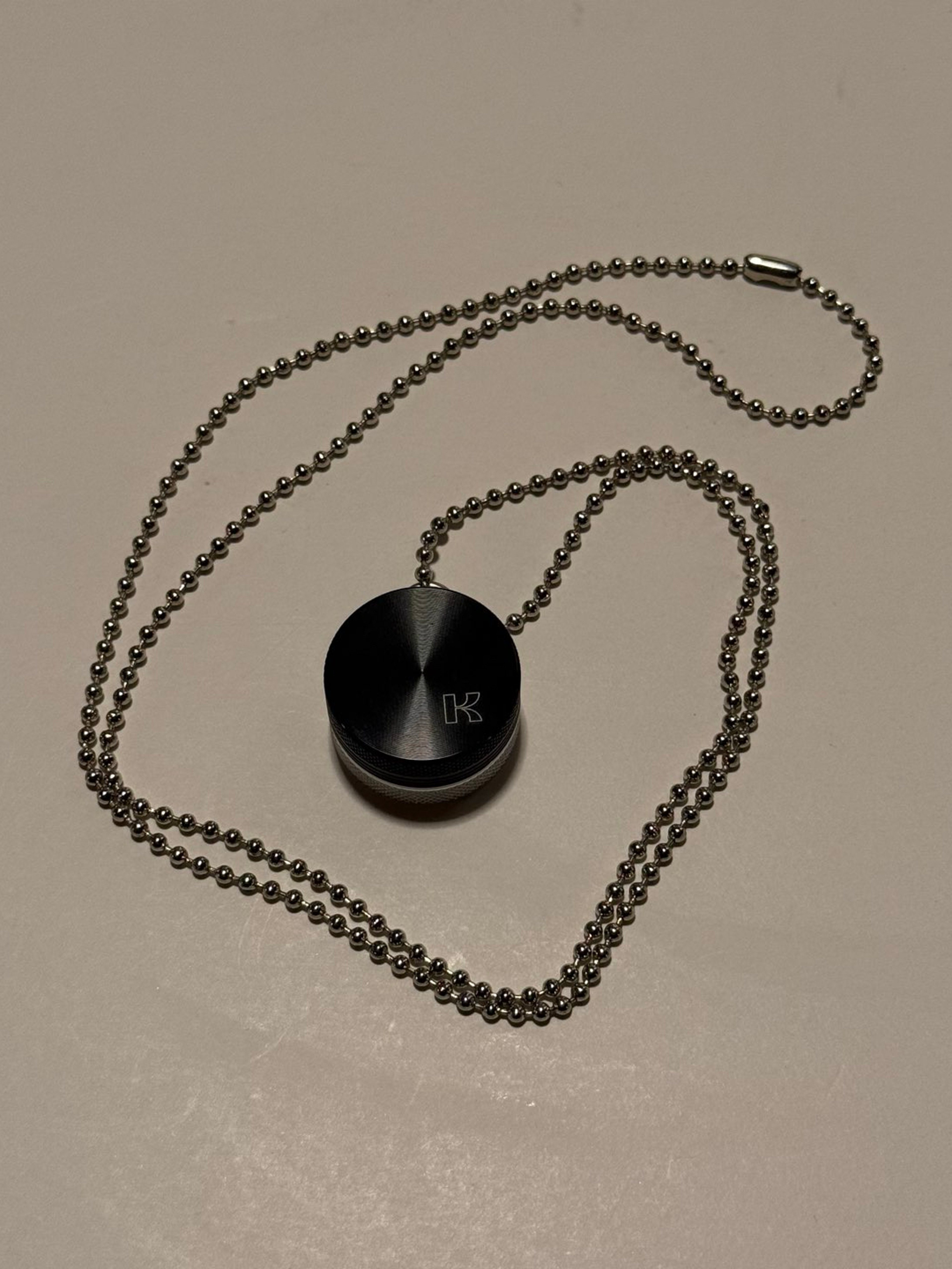 Preview pic of Kannastör Mini Grinder Pendant w/ Chain