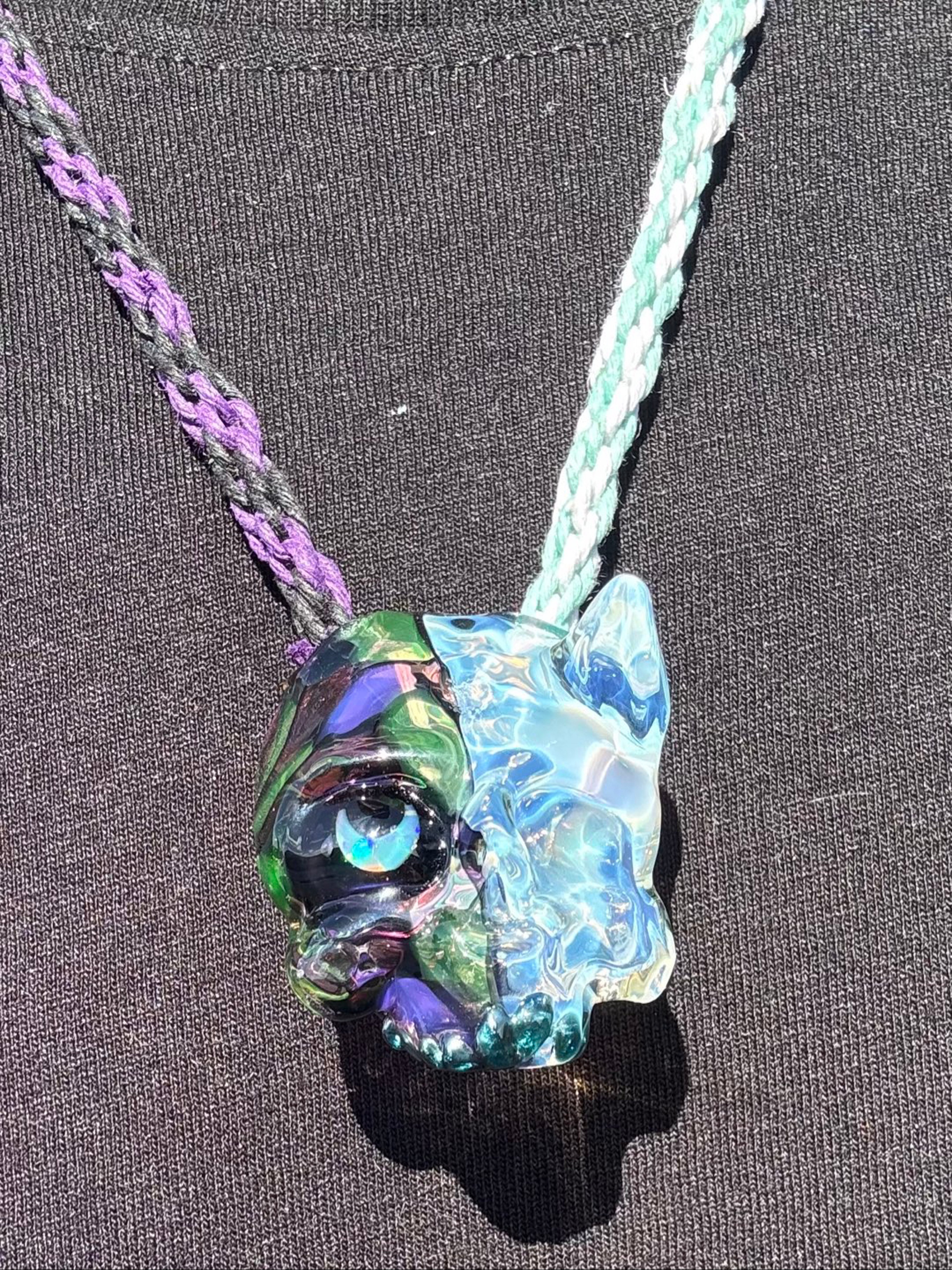 Preview pic of RARE* Split personality opal eye full UV angel/demon skull pendant !!🔥