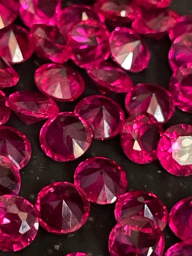 Preview pic of 10x for $25— 5mm Faceted Diamond Cut Ruby Pearls