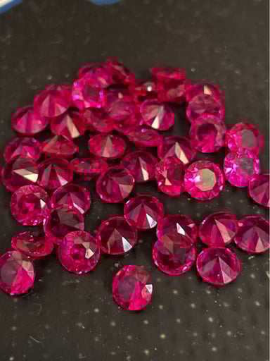 Preview pic of 10x for $25— 5mm Faceted Diamond Cut Ruby Pearls