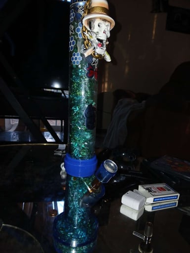 Preview pic of Bong three piece with glow in the dark patterns and a pirate skull
