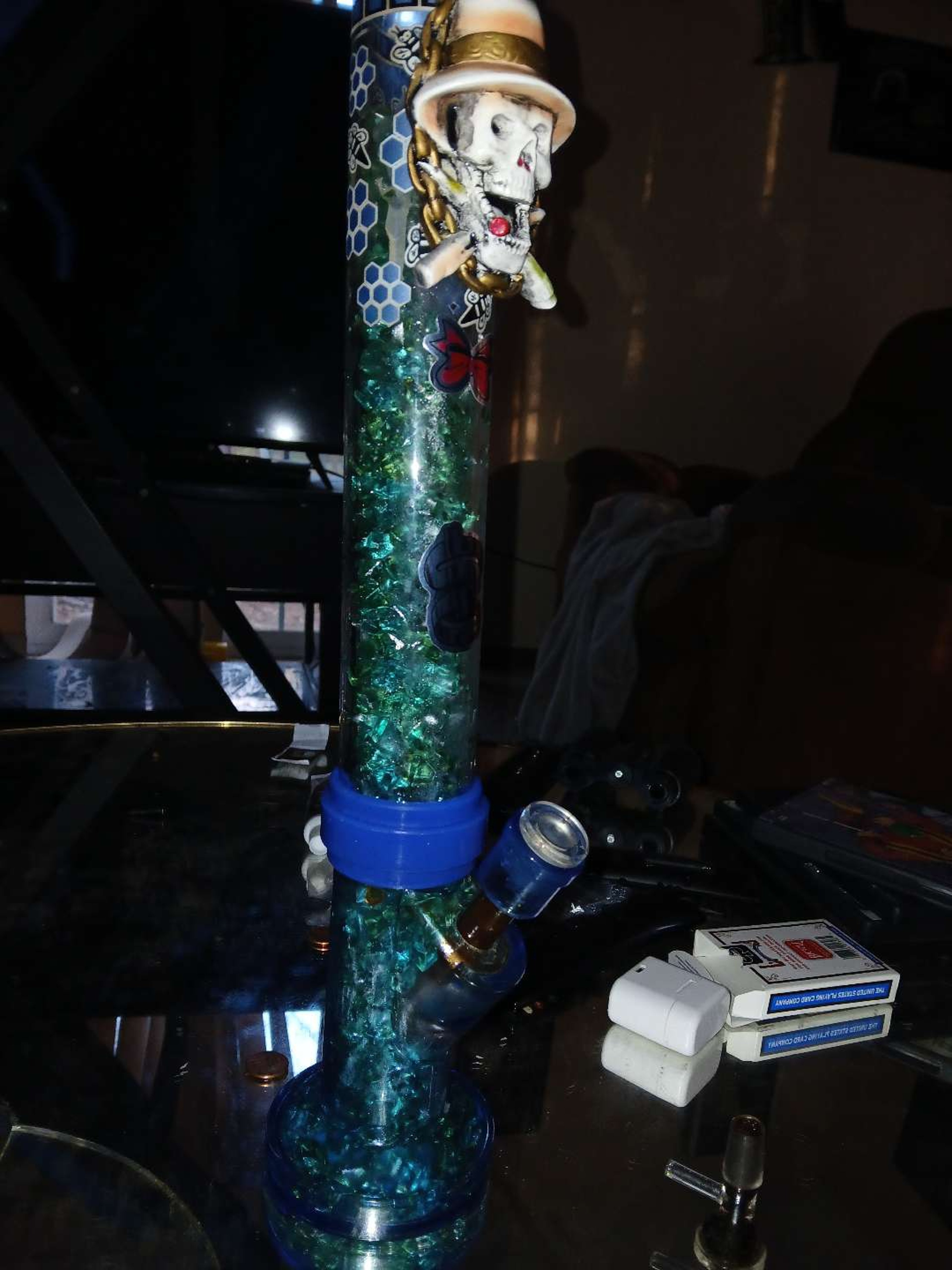 Preview pic of Bong three piece with glow in the dark patterns and a pirate skull