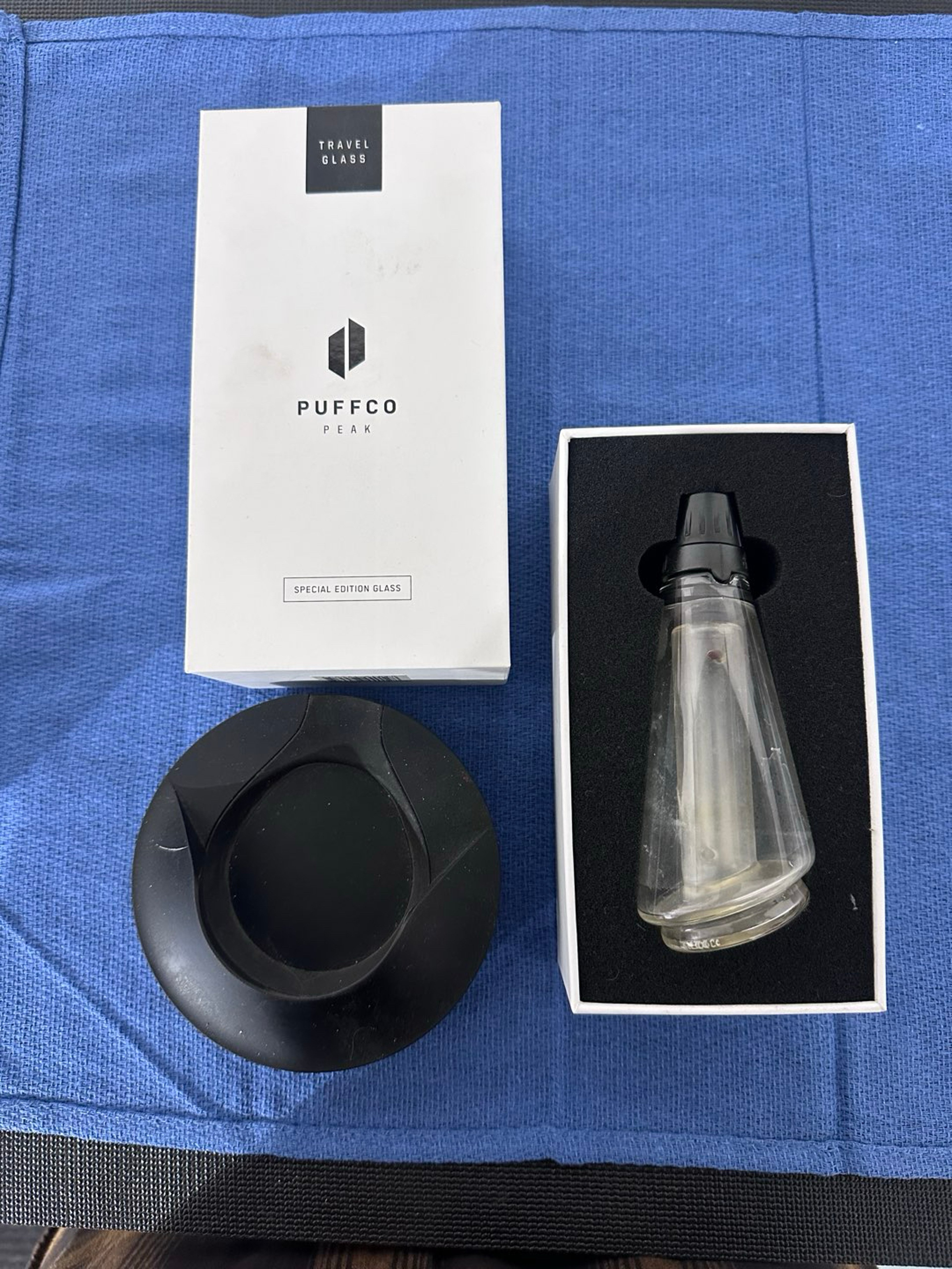 Preview pic of Puffco travel case and base charger