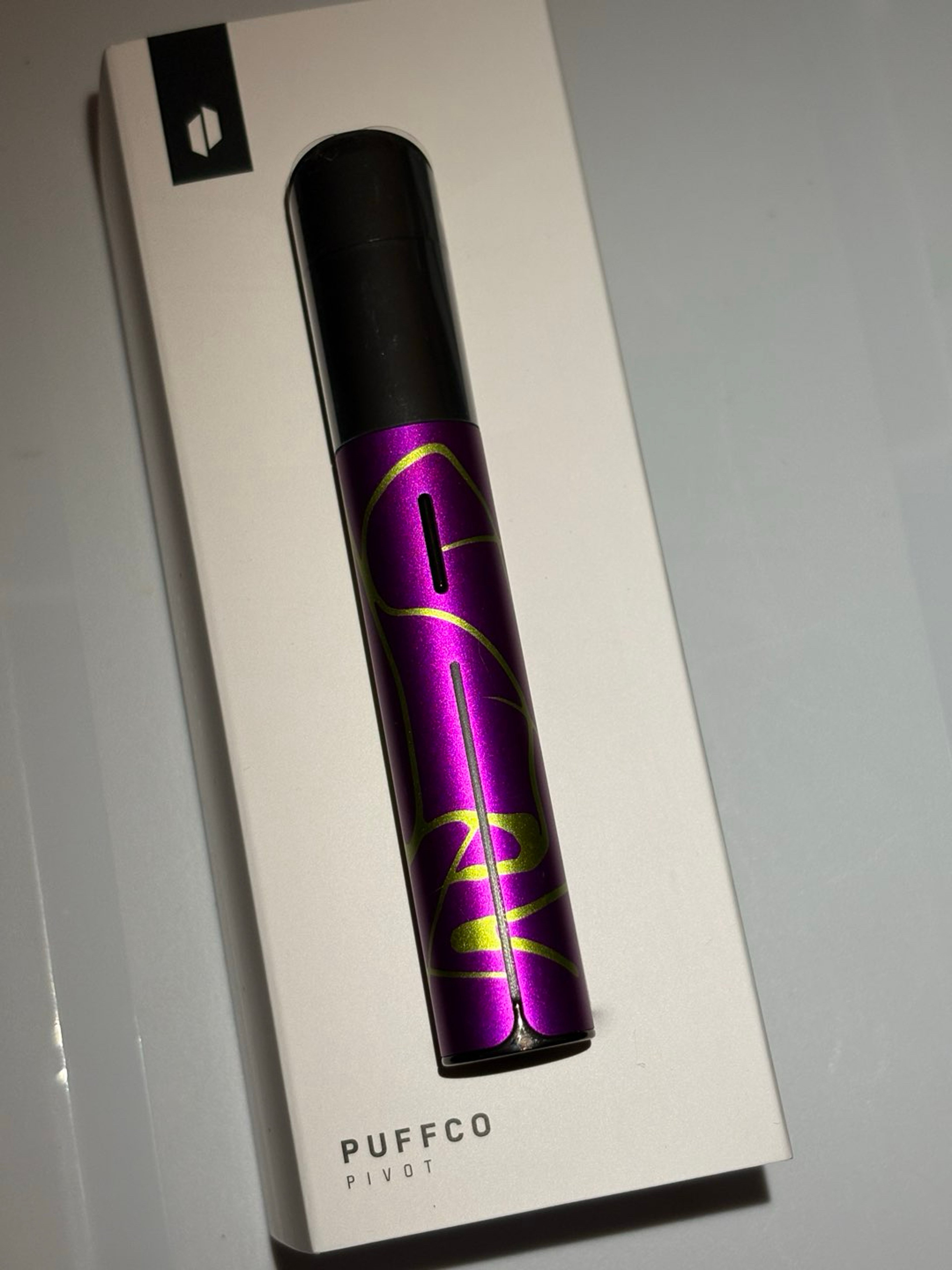 Preview pic of “A” Puffco Pivot Riddler Purple/ Green