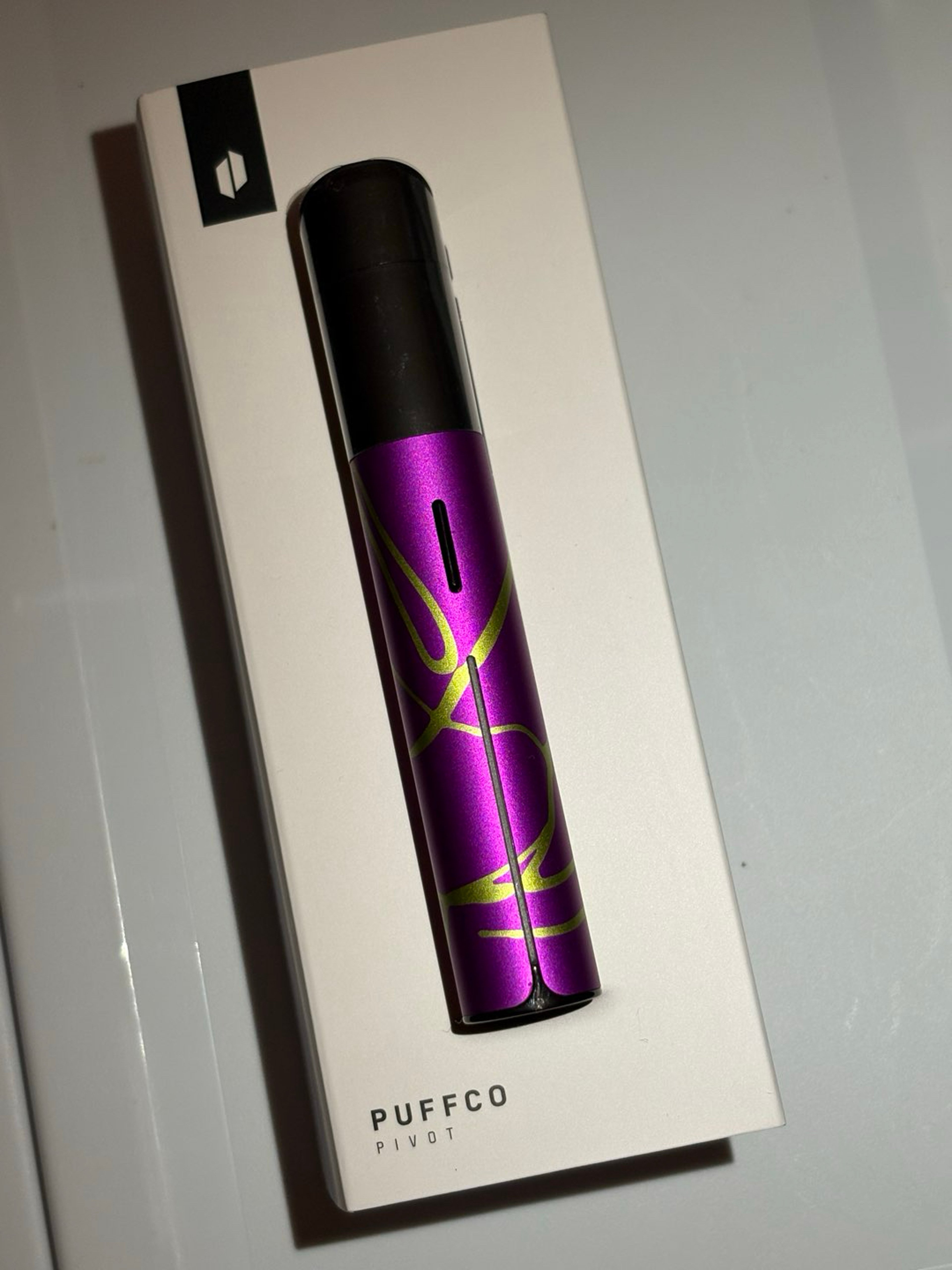 Preview pic of “B” Puffco Pivot Riddler Purple/ Green