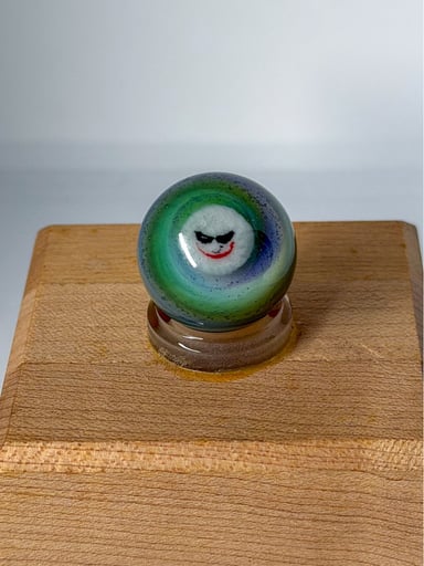 Preview pic of “The Joker” 1in Worked Millie Marble