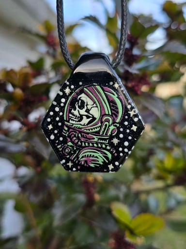 Preview pic of Astronaut Skull Layered Glow Pendant