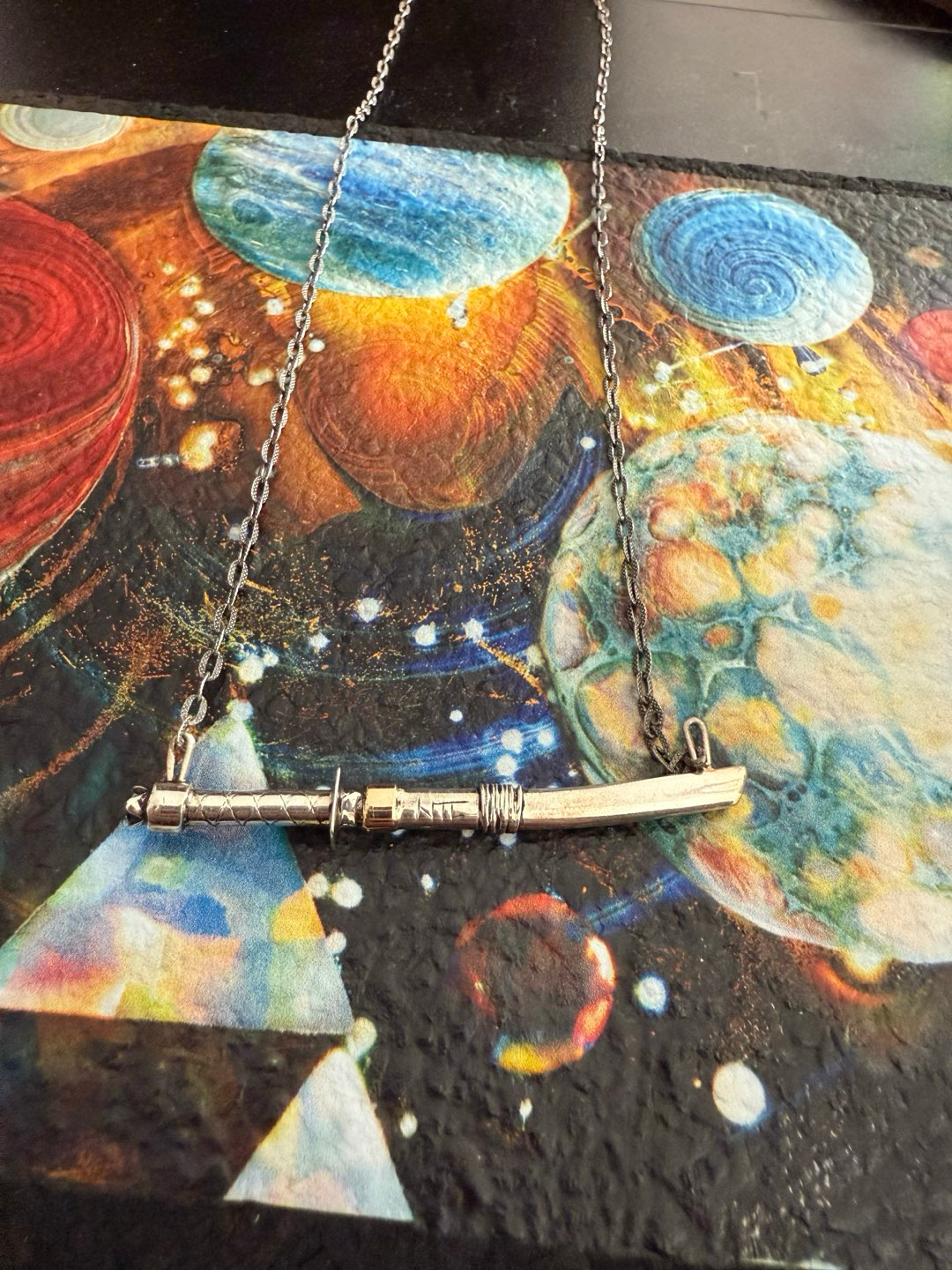 Preview pic of DABURAI TITANIUM KATANA DABBER W/ TANZANITE IN THE BUTT AND FULLY WORKED CHAIN