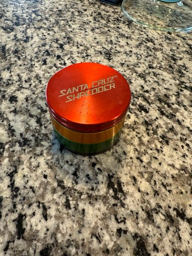 Preview pic of Santa Cruz Shredder Large Rasta Colored 4 piece