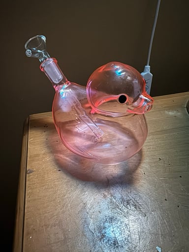 Preview pic of A pink duck bubbler that you can smoke stuff from its butt. 14mm clear bowl included