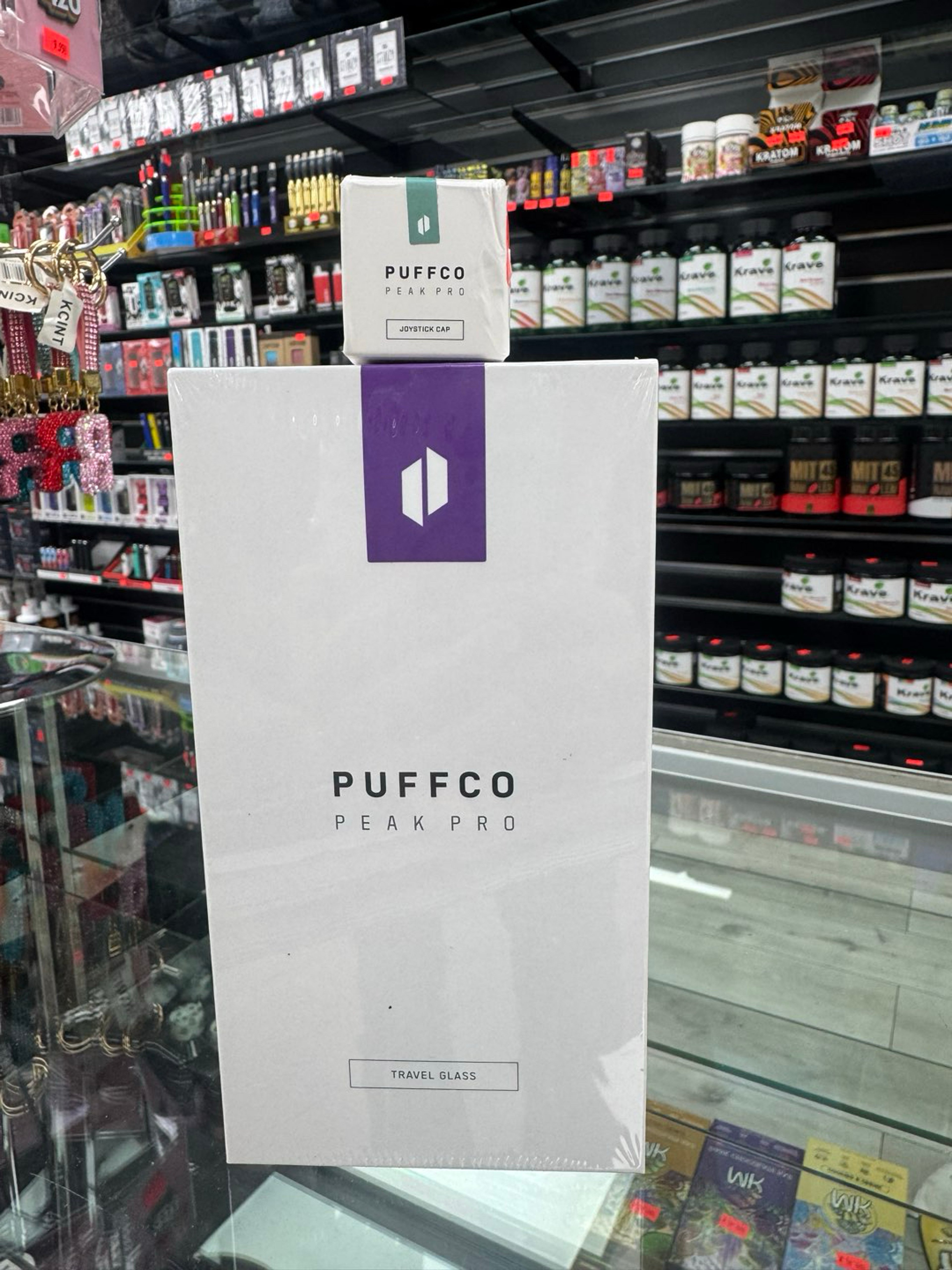 Preview pic of Puffco purple travel glass and flourish joystick cap