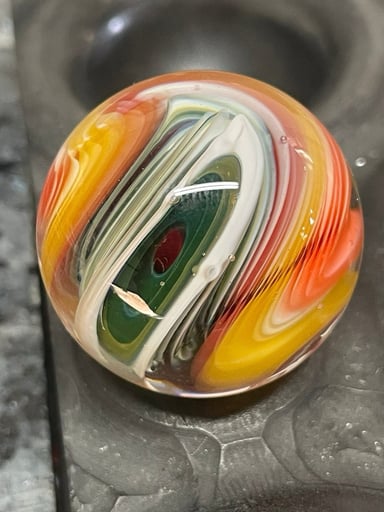 Preview pic of *AndyMelts* 🪐29mm UV FLUORESCENT Color Swirl MIB🪐